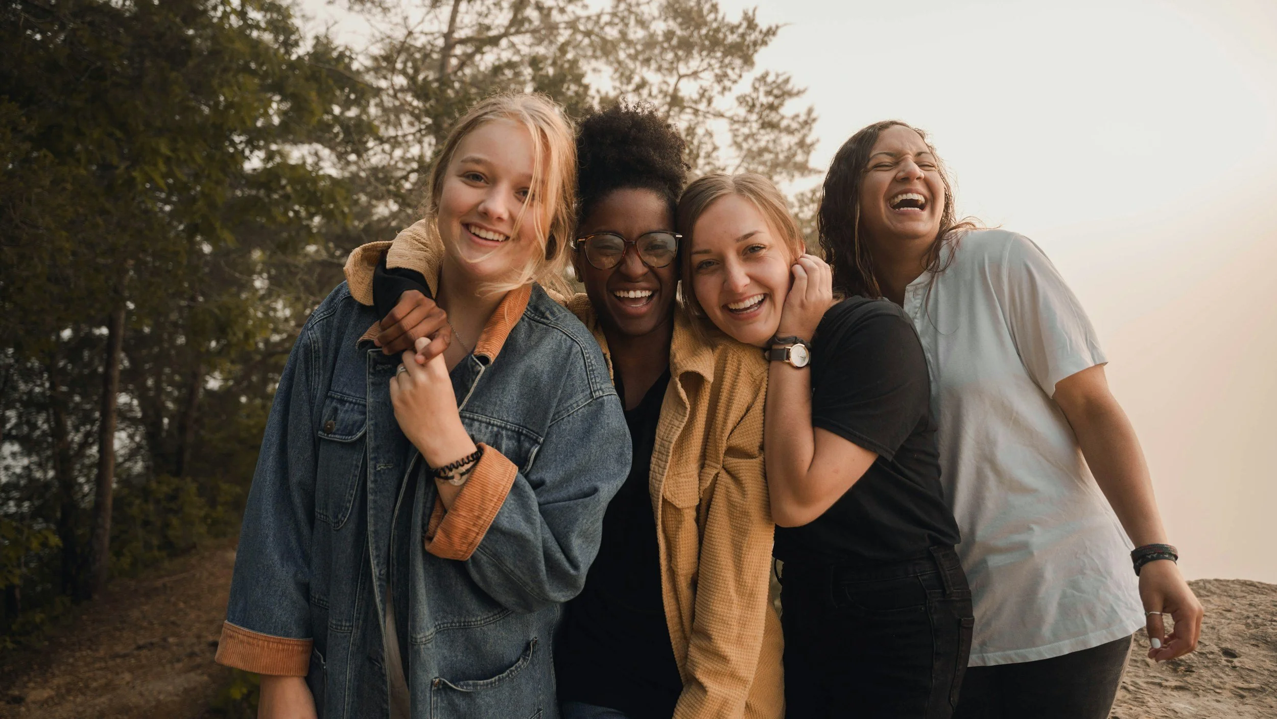 group of young women smiling at camera