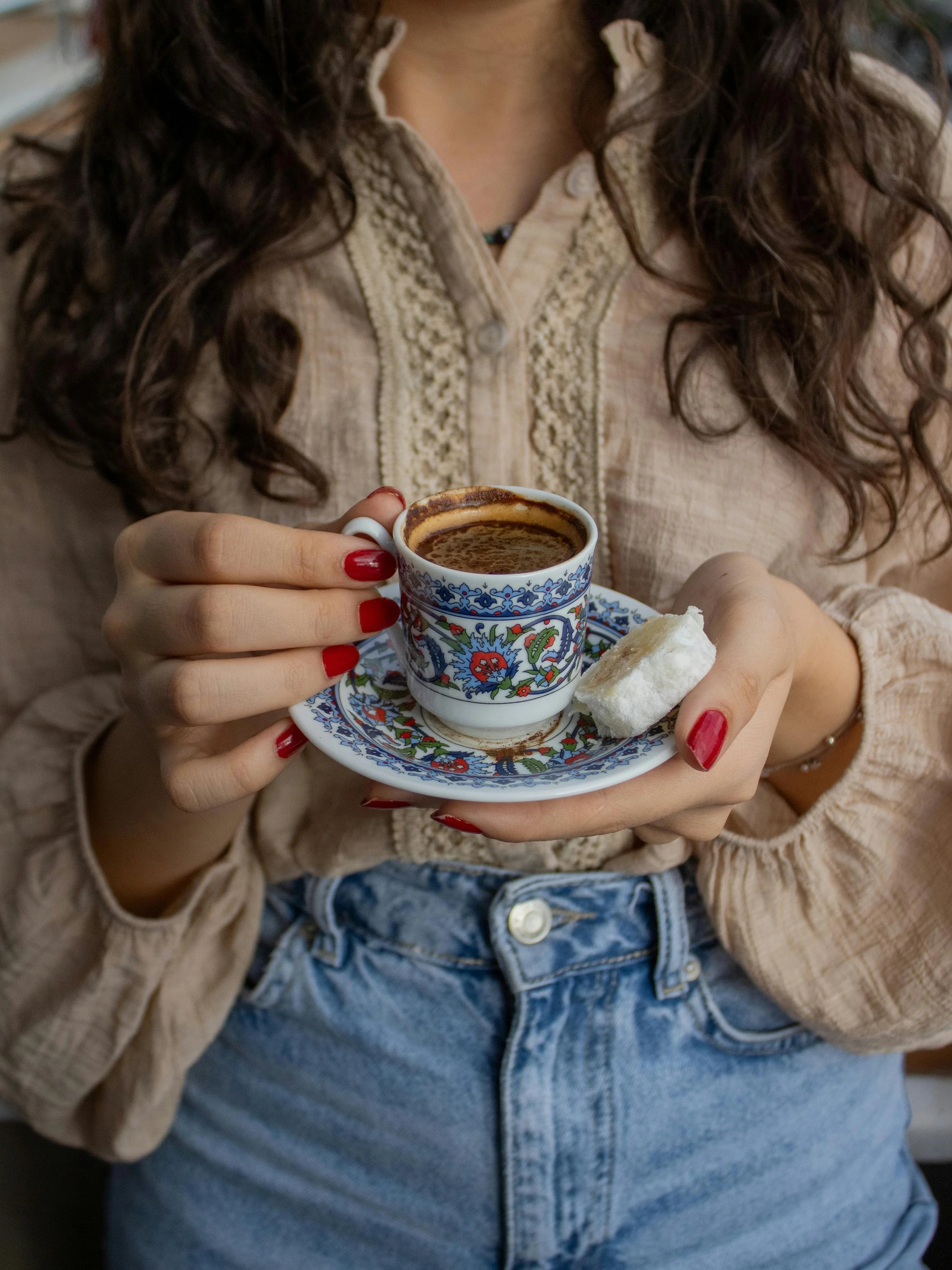 woman holding tea cup