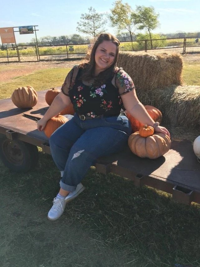 teen therapist sitting outside smiling