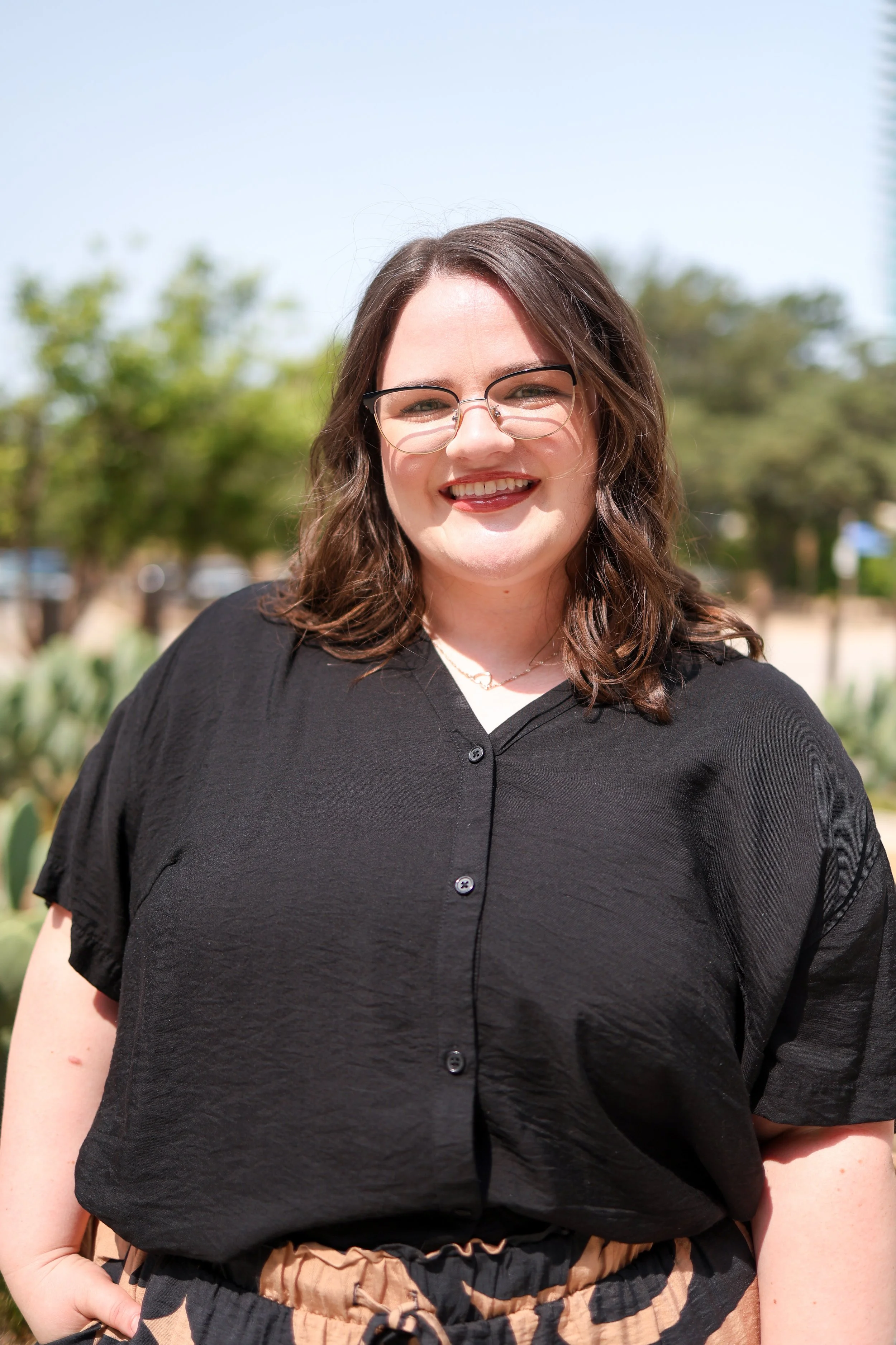 Dallas EMDR therapist smiling outside