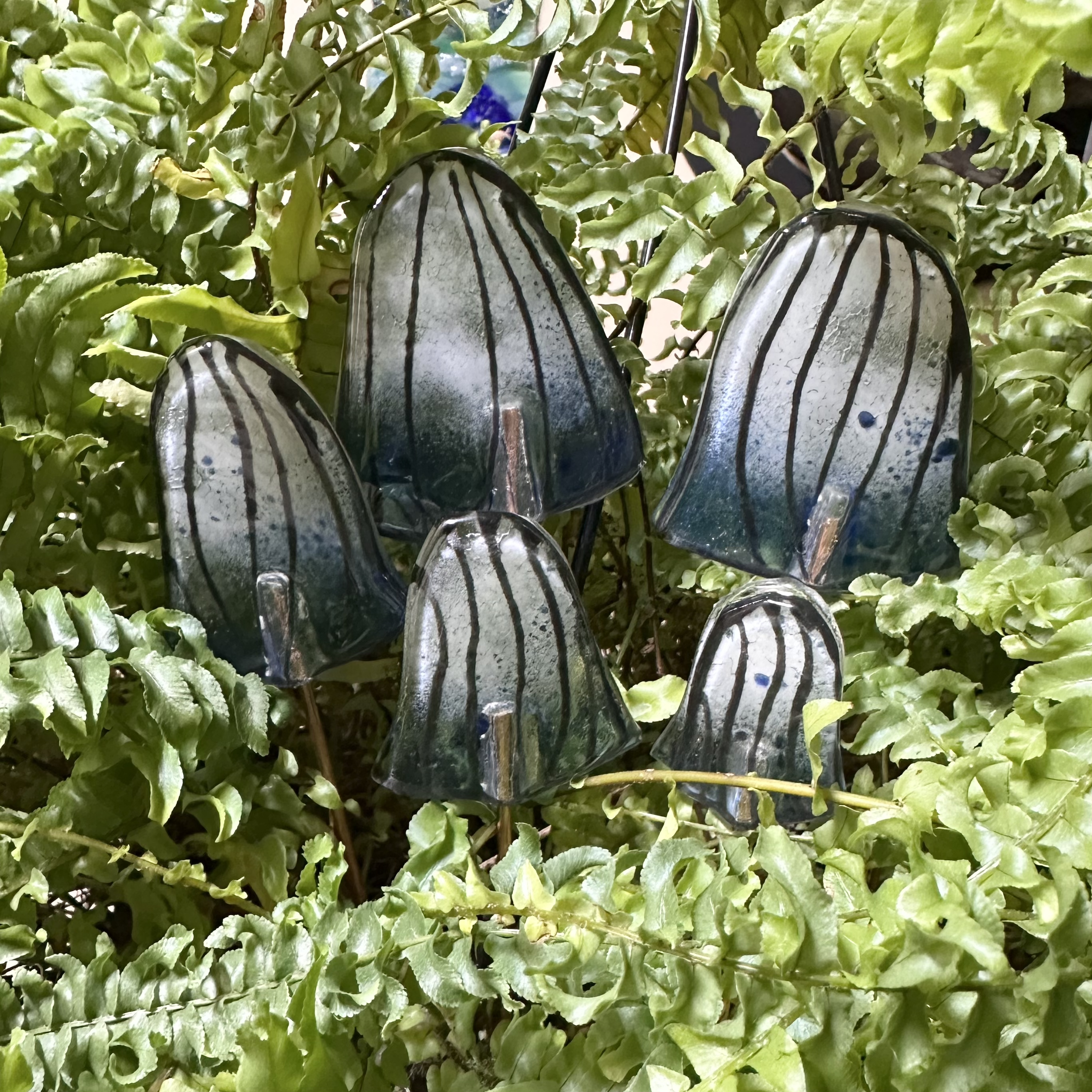 Mushroom Cap Set ($48) Est 1-1.5hrs
Bring some creative color to your plants with this Mushroom Cap Set.  Cut your mushrooms out of clear glass then choose to use glass powders, mosaic glass, paints and bubbles to create your design. Each cap has a c