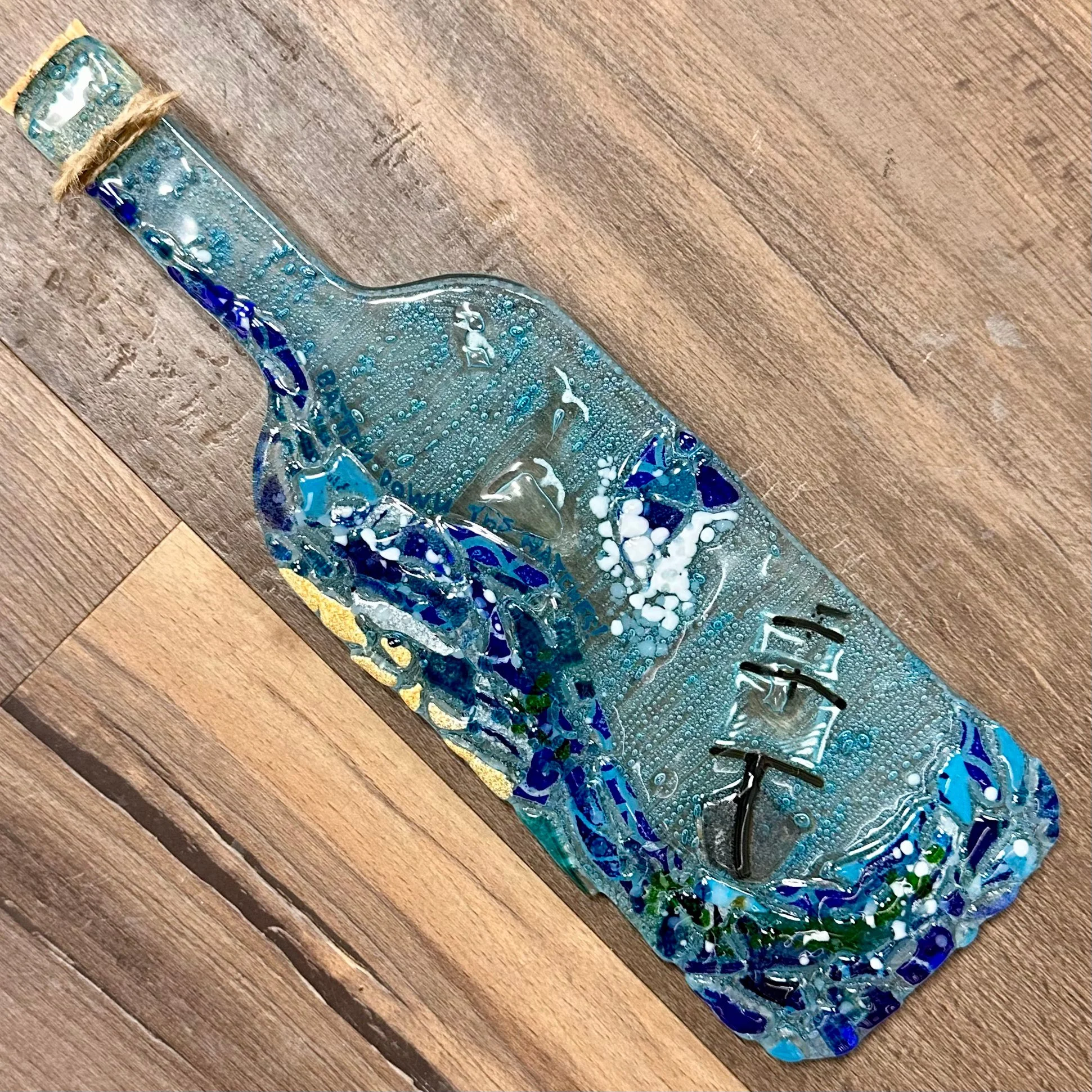Message in a Bottle ($86) Est. 2-2.5hrs
Just imagine… a stormy night, rain coming down on raging waves, a struggling boat in the distance trying to stay afloat in the vast ocean. What story will you tell? 
We’ll mosaic, add bubbles, create an impress