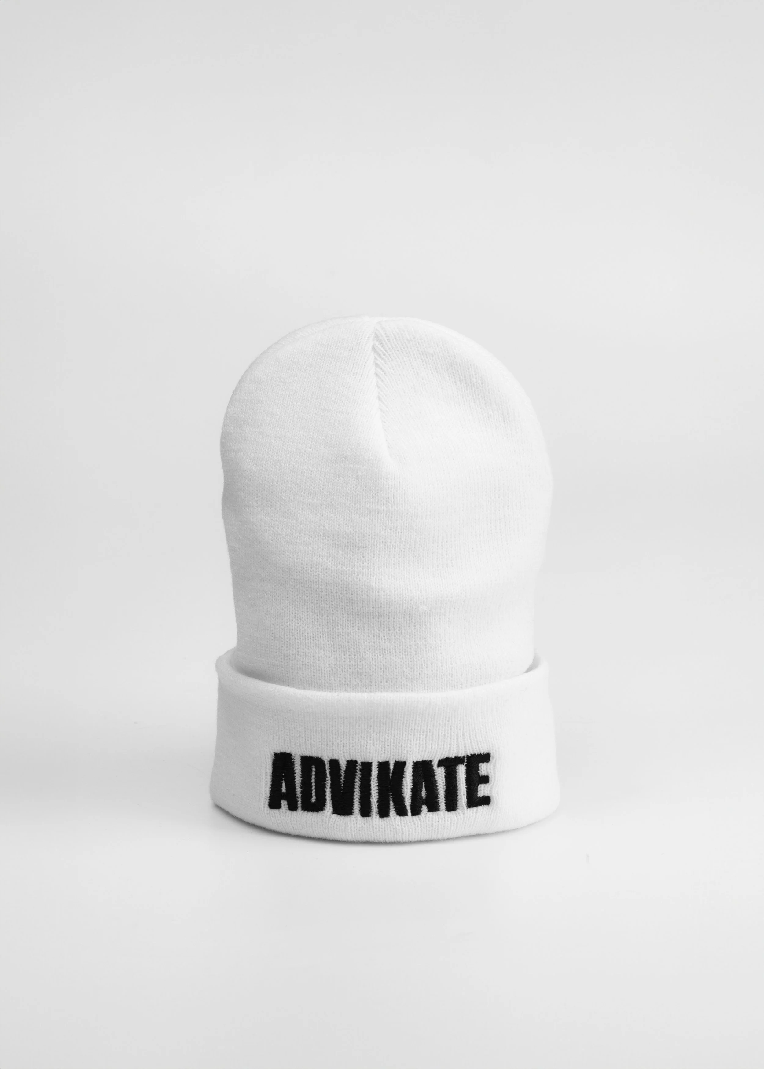 ADVIKATE Classic Beanie Series II in White, front shaped product photo, showing the beanie form and cuff embroidery.