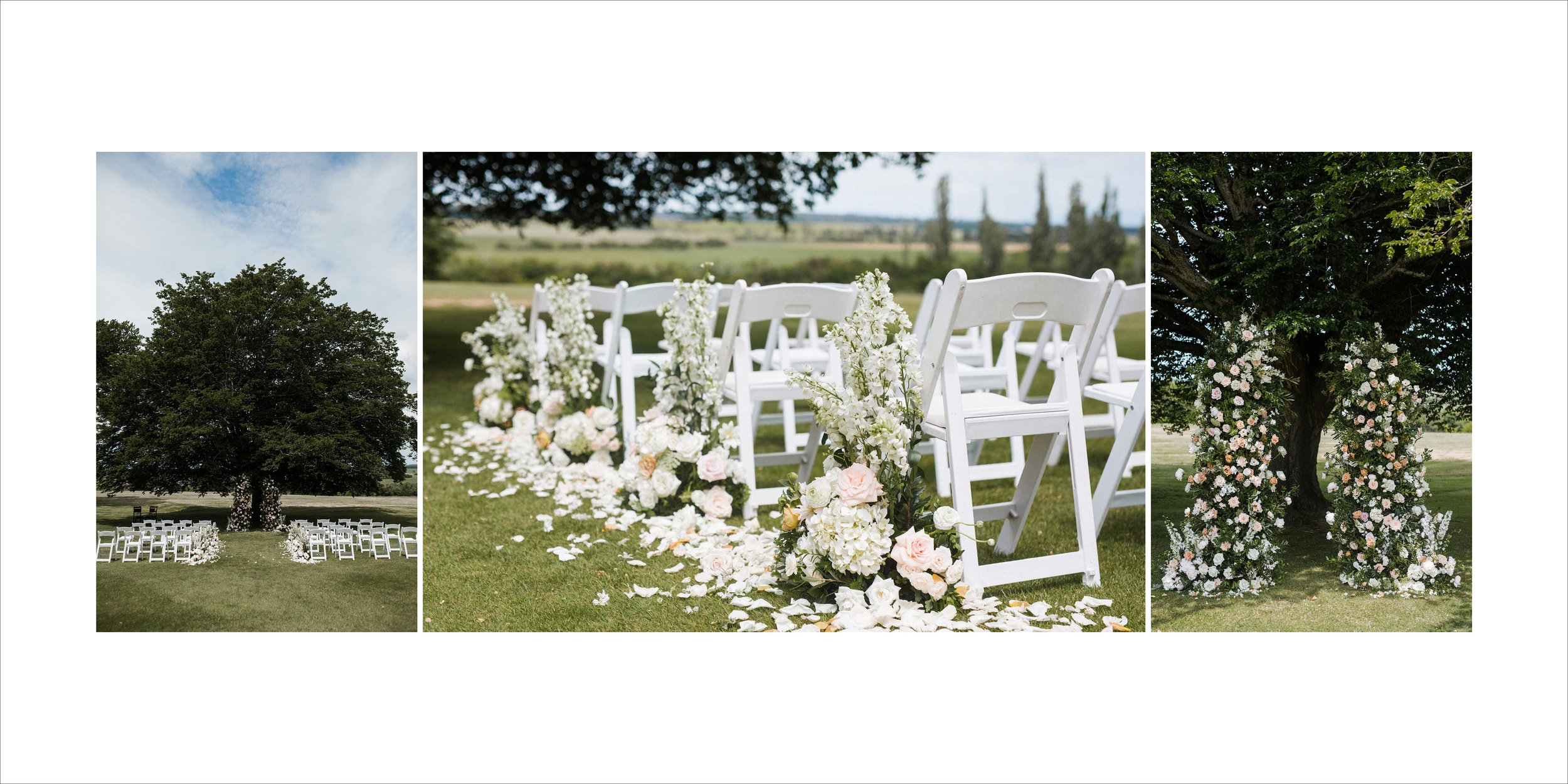 Decorated outdoor wedding venue featuring a large tree with hanging flower arrangements, white chairs with floral arrangements on the aisle, and a floral arch under a tree.