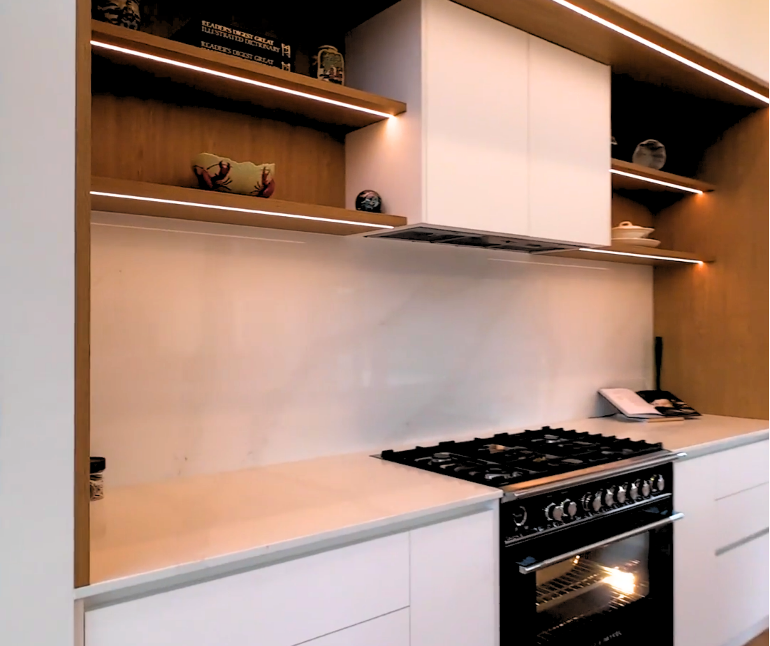 volt solutions electrician installed LED strip lighting in floating shelves of high end kitchen in Mangawhai