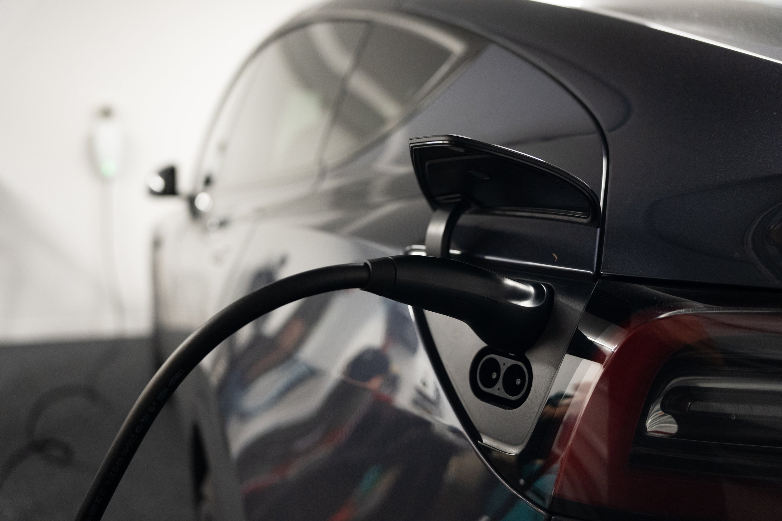 Tesla wall charger installed at a residential home in Orewa by Volt Solutions electricians.