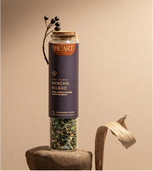 Tall canister with purple label that reads Relaxo Rancho for Sleep, Stress and Anxiety support