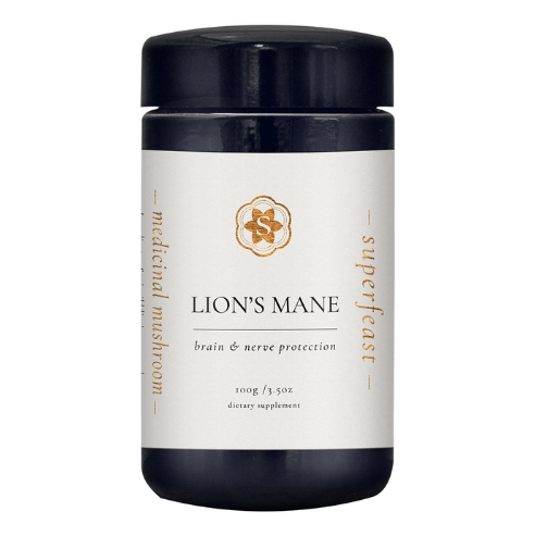 black canister with white and gold label, words LION'S MANE on the front
