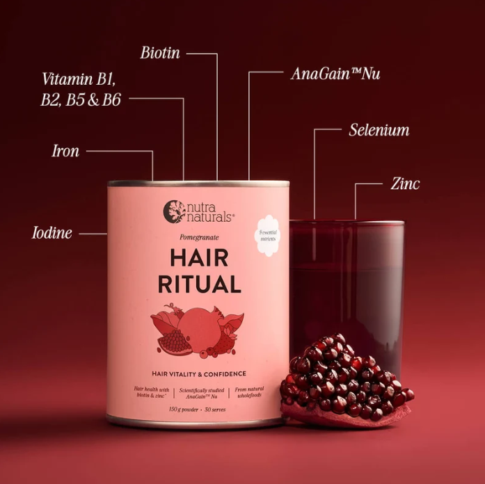 Picture of pink and red canister with 'hair ritual' printed on front, showing all ingredients listed