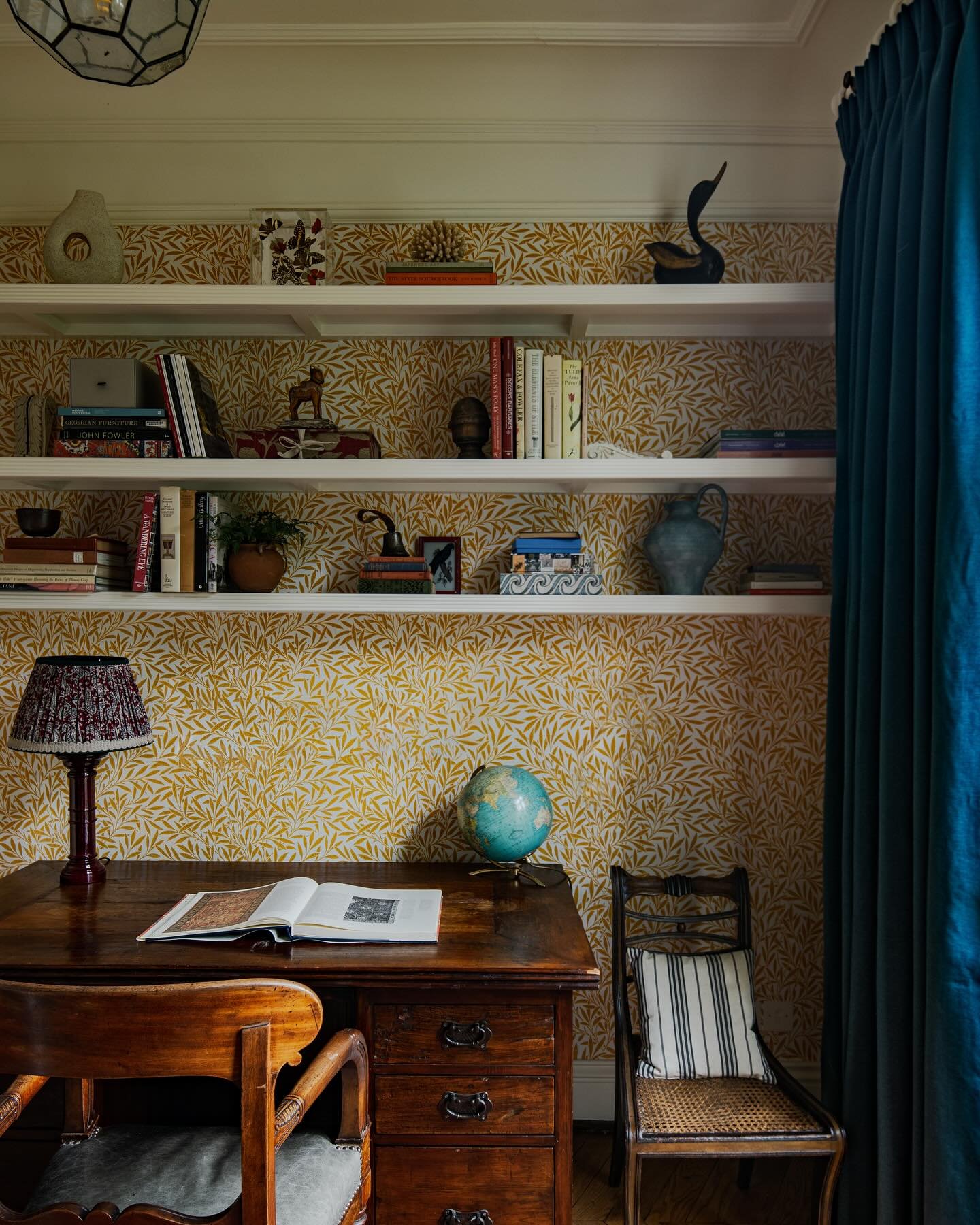 Lovely surprise to see this project pop up on the @houseandgardenuk grid today. 

Working around the clients existing bookshelves we papered the walls in @wmorrisandco &lsquo;Willow Bough&rsquo; in yellow by @benpentreath 

📷 @paul_whitbread_photo 
