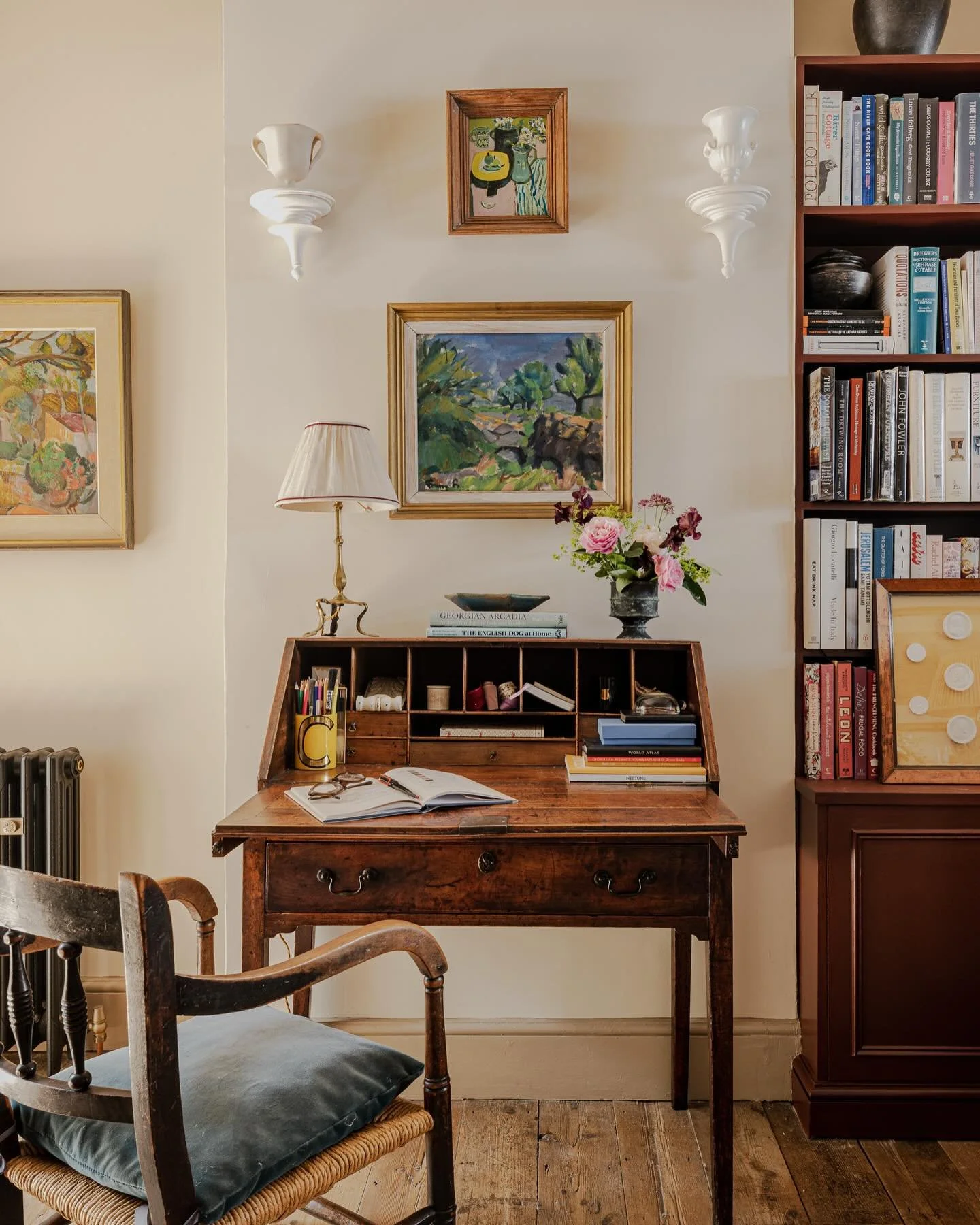 There is something quietly poetic about a writing desk.  A place set aside for thought, for pen to paper, for words chosen with care.

This small antique bureau sits in my own sitting room, and when I look at this photograph I am reminded that beauty