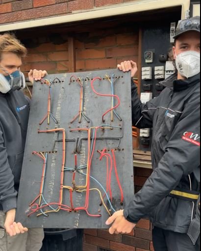 Isaac & Chris asbestos board.JPG