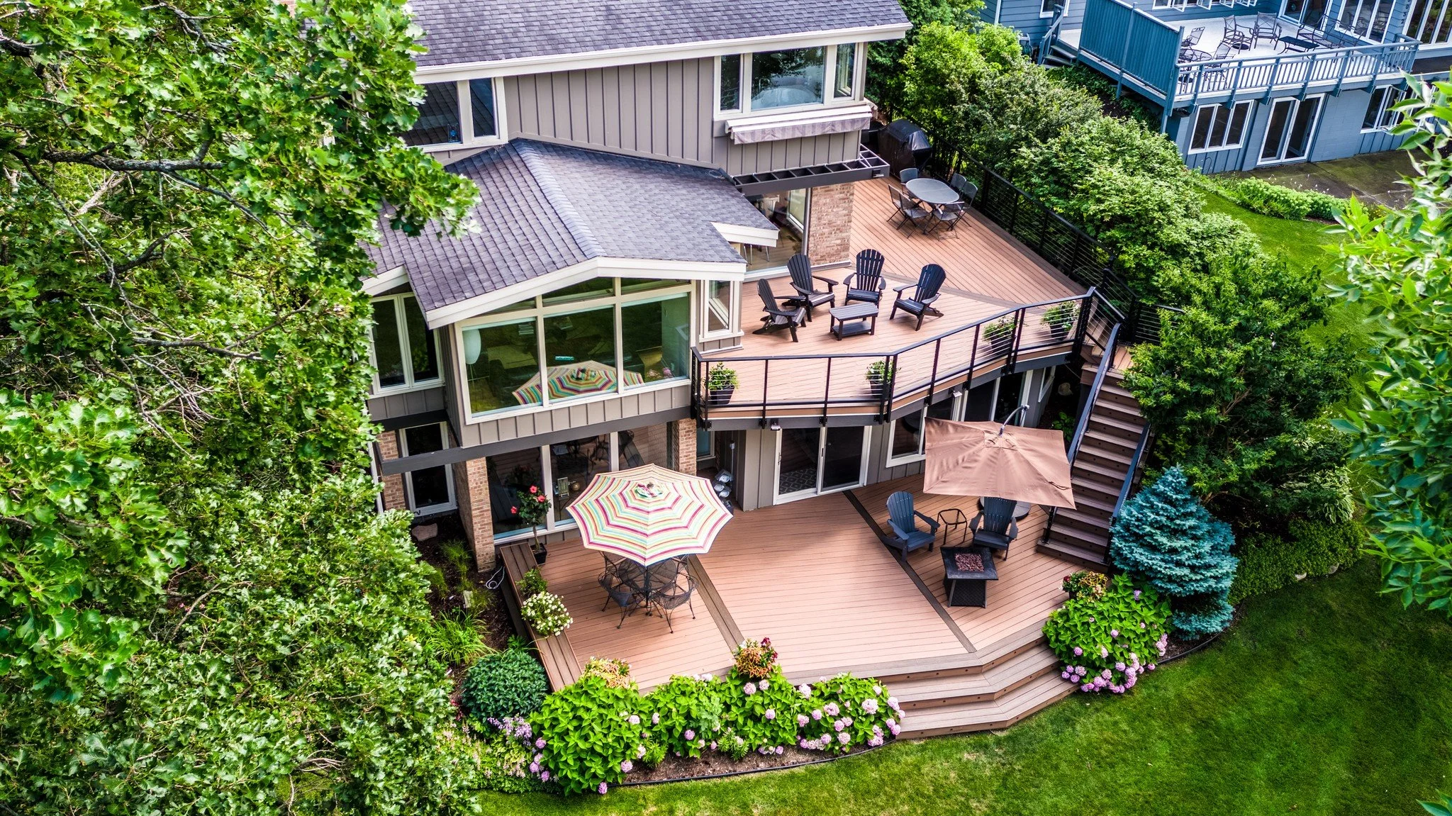 Where craftsmanship and outdoor lifestyle meet. #ArtisanDeckandOutdoorLiving #madisonwideckbuilder #artisandeck #TrexPro #narimadison