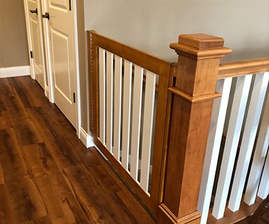 Two tone gate for stairs - white and stained wood