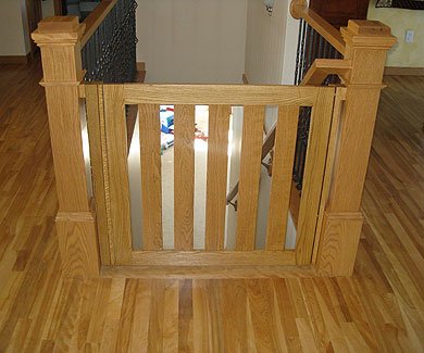 Wooden gate for top of stairs - stain matched
