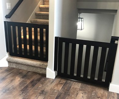 Black wooden gates for stairs