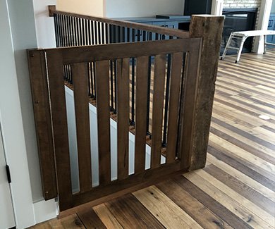 Dark wood stained custom safety gate