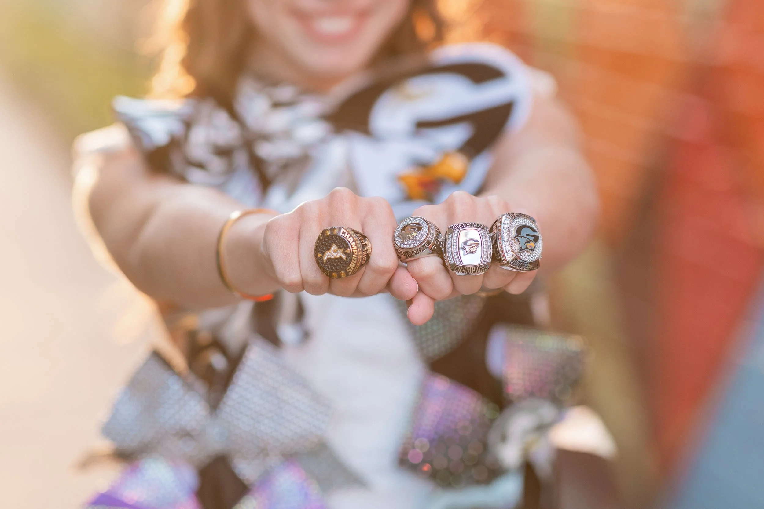 Gray Collegiate cheerleader
