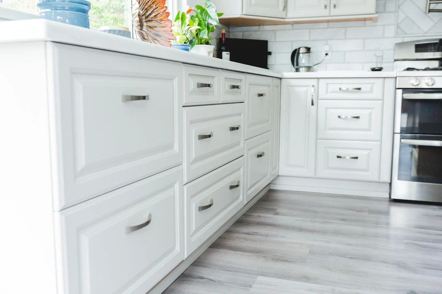 Fun Fact: White cabinets are the most popular choice for kitchens. They're timeless, versatile, and can make your space feel larger. We're here to help you design your dream kitchen. #KitchenDesign #WhiteCabinets #BeniciaHomeImprovement