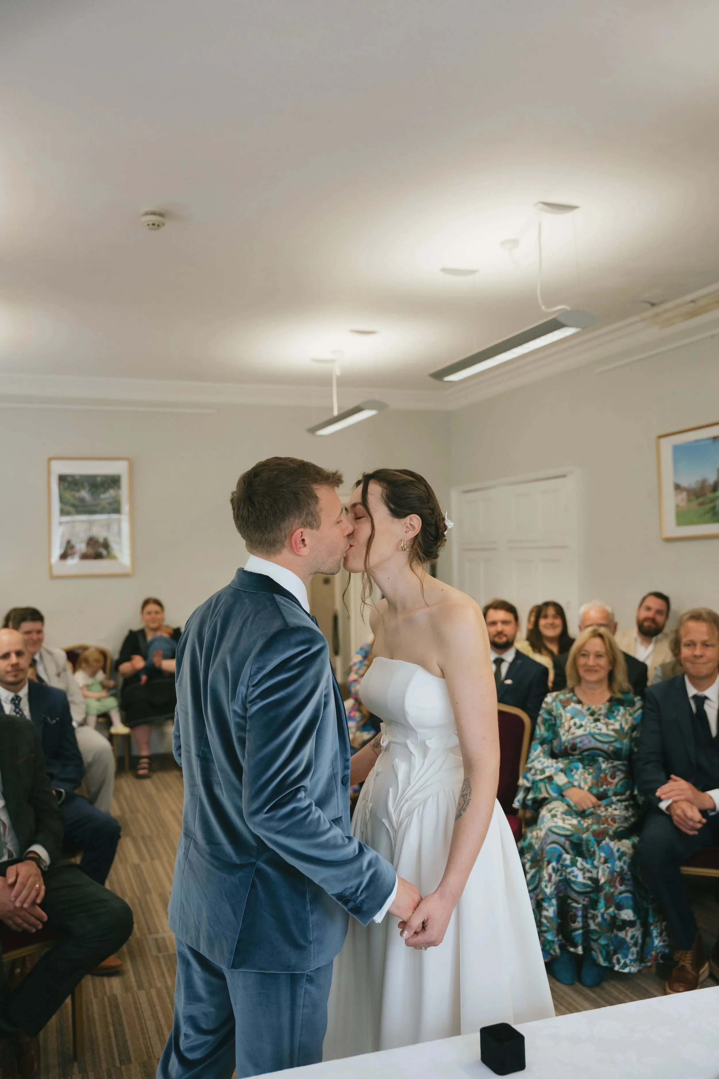 couple married at registry kissing after ceremony Torquay location