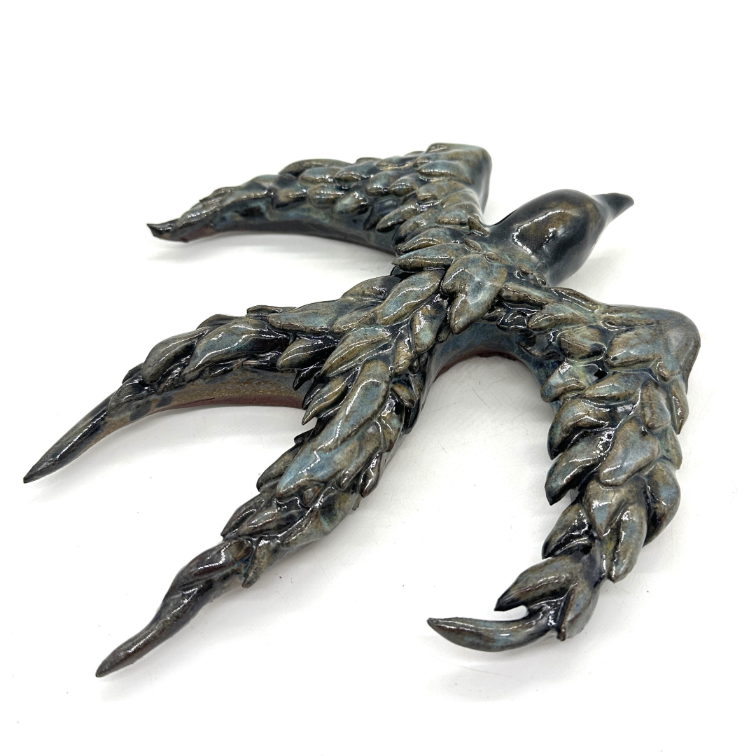 RUFFLED FEATHERS, BY EMMA MOORE