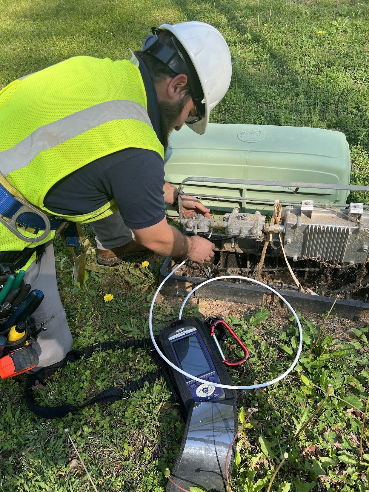 CUI field technician maintaining network equipment