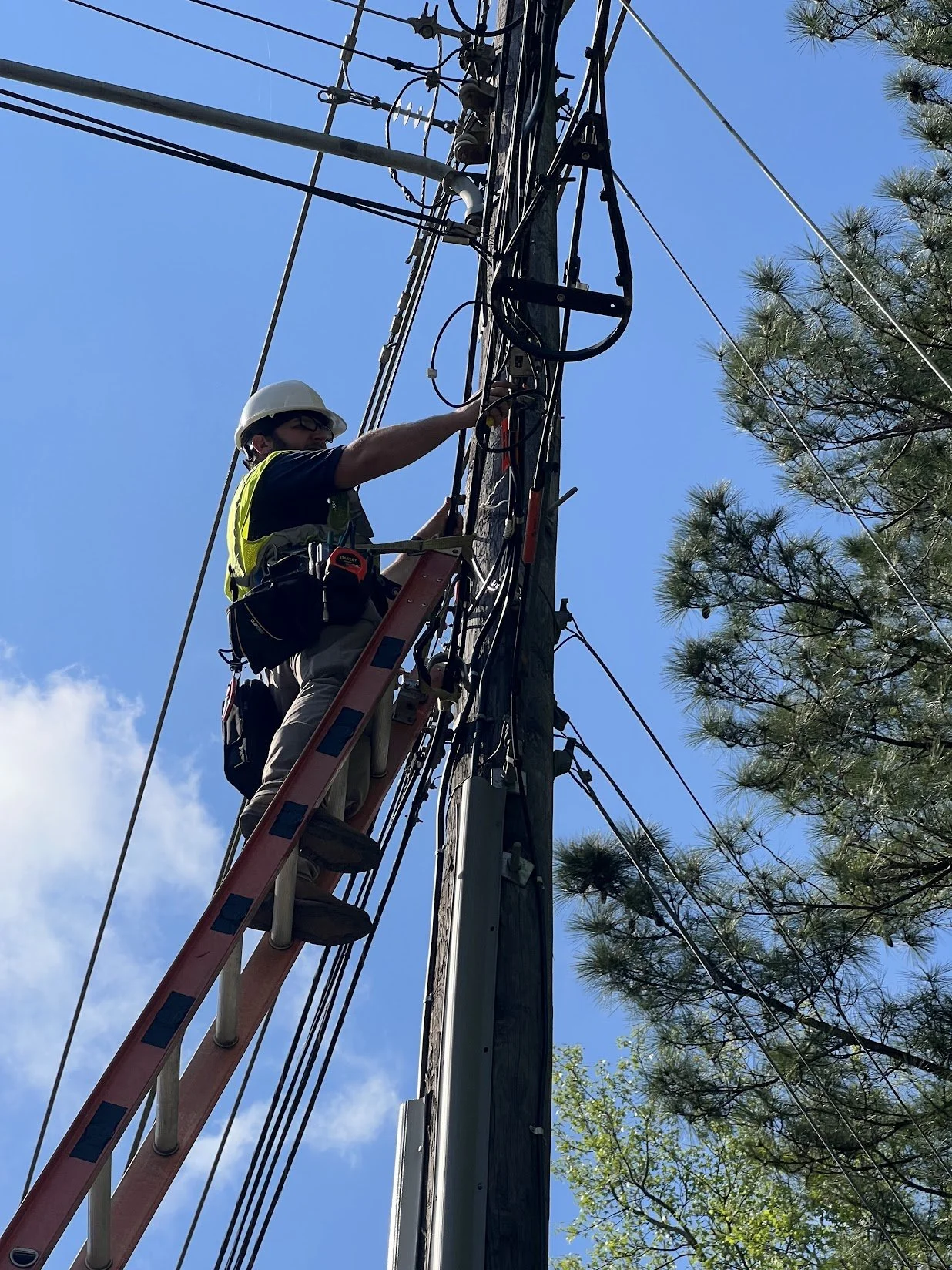 CUI technician working on network infrastructure