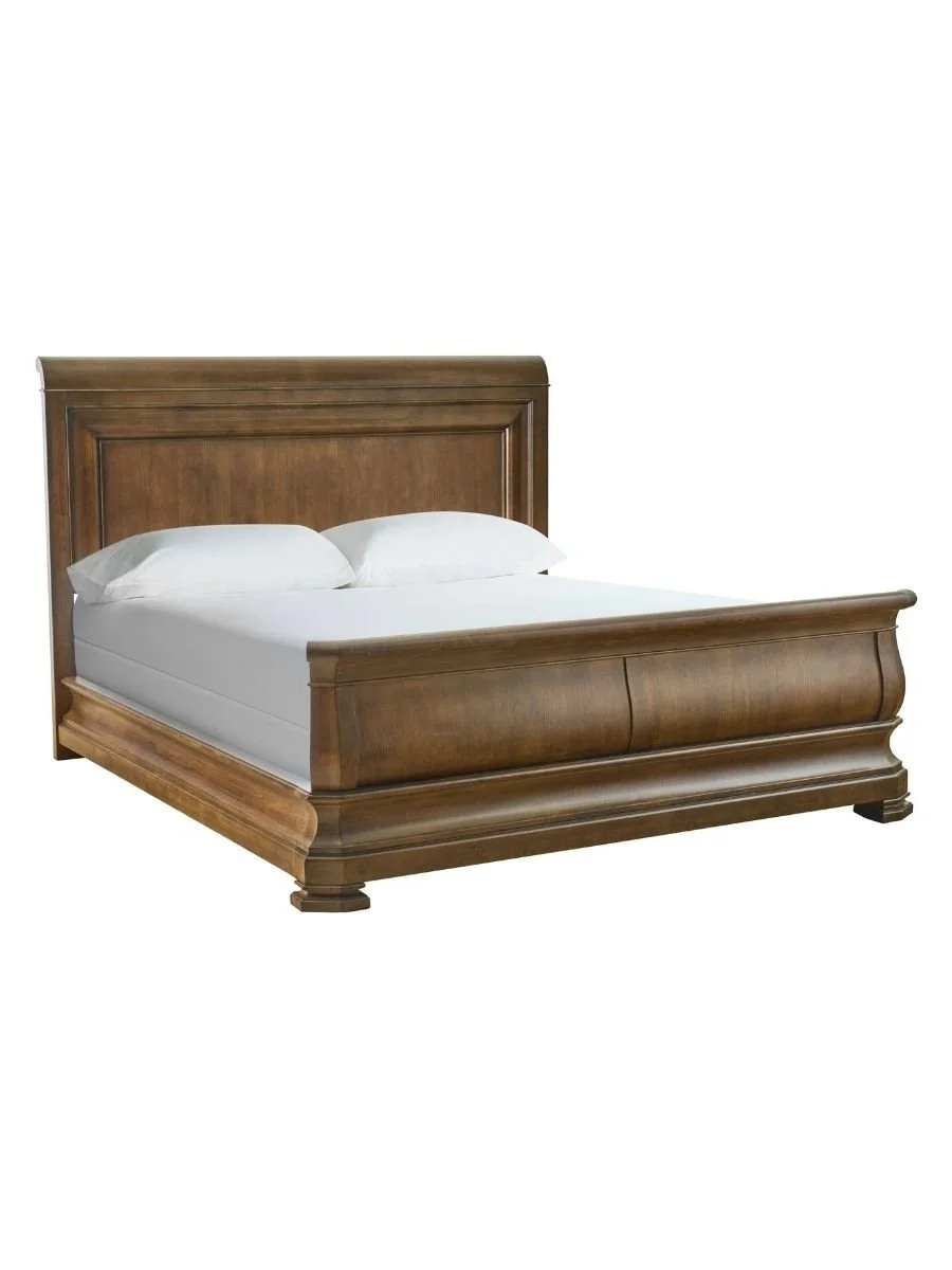 Universal Furniture New Lou Louie queen sleigh bed in cognac showing headboard and footboard detail, available at Curated Furnishings in Richmond, VA