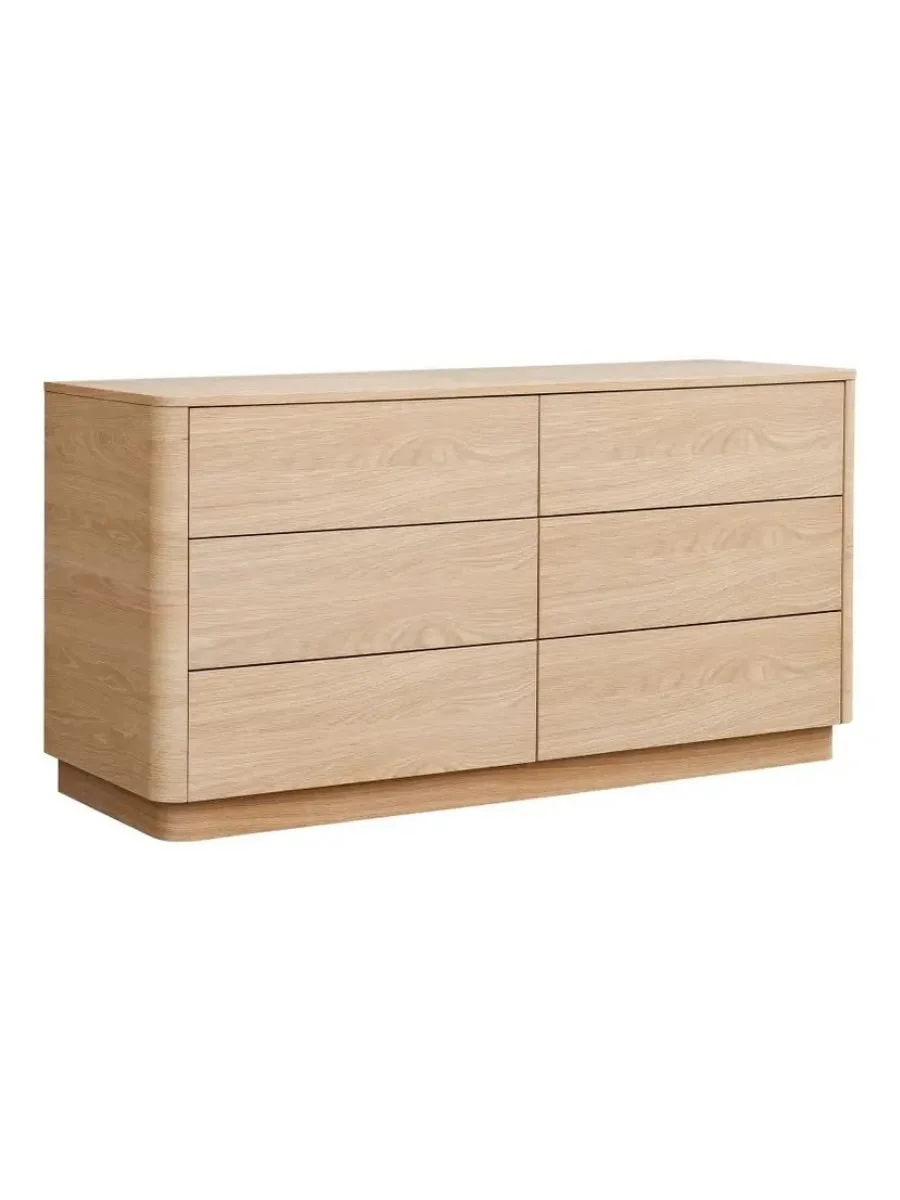 Round Off six-drawer dresser in light oak showing rounded corner detailing and low-profile silhouette, available at Curated Furnishings in Richmond, VA