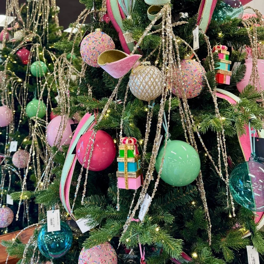 Christmas decorations in frosted pink, blue, and green with whimsical, candy-inspired accents and sparkling holiday ornaments.