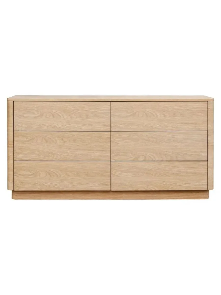 Round Off six-drawer dresser in light oak with rounded corners and soft-close glides, available at Curated Furnishings in Richmond, VA