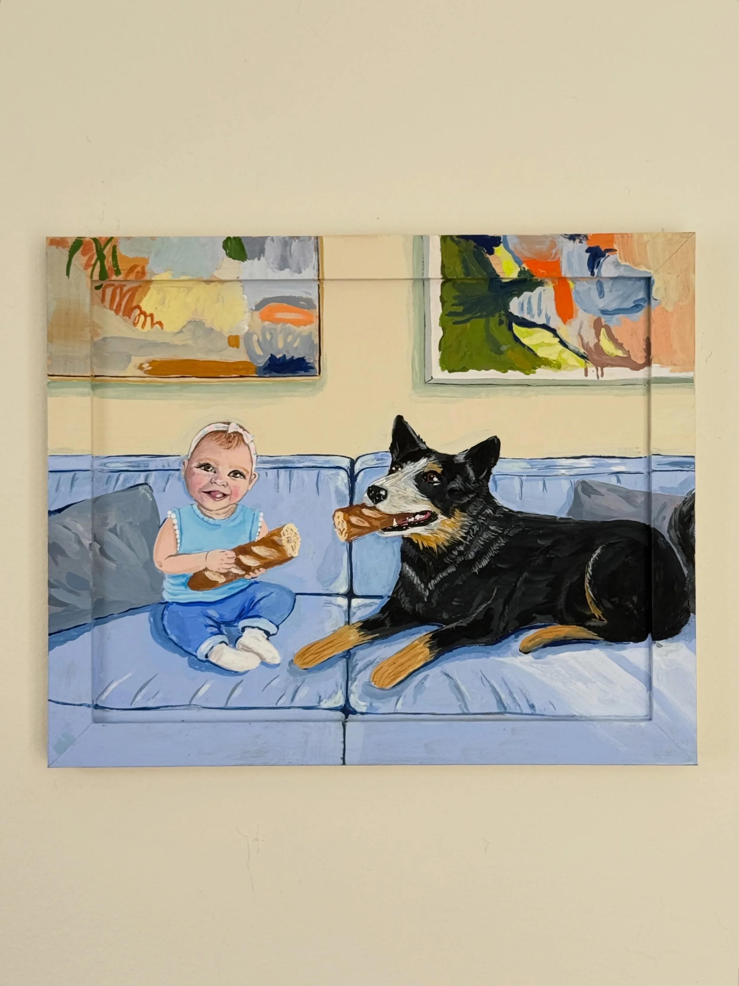 Babies breaking bread for an old friend 👼🏻🥖🐶 featuring some special paintings from her mother in law in the background
