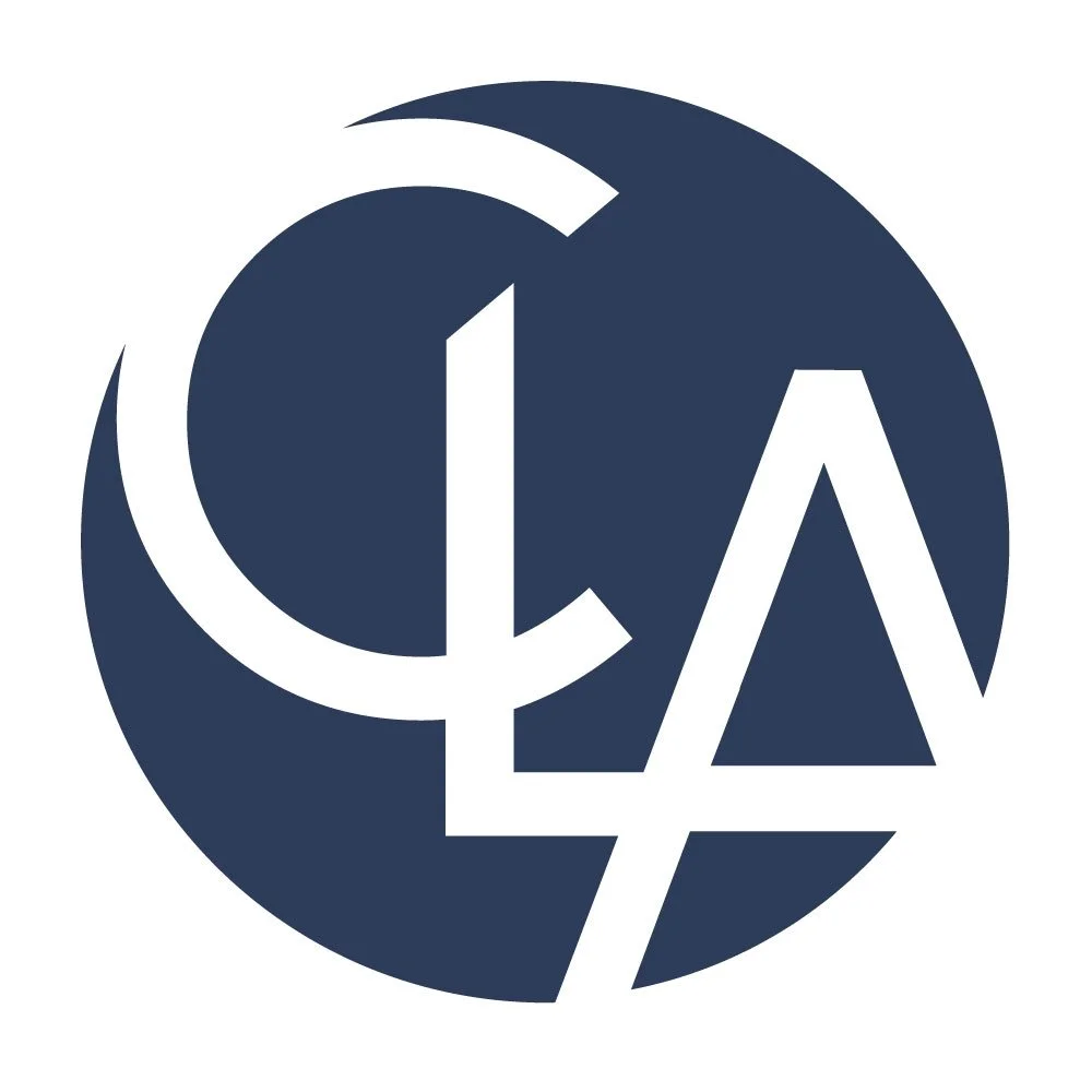 A dark blue circular logo with the Greek letters Chi, Lambda, and Alpha stylized and interconnected.