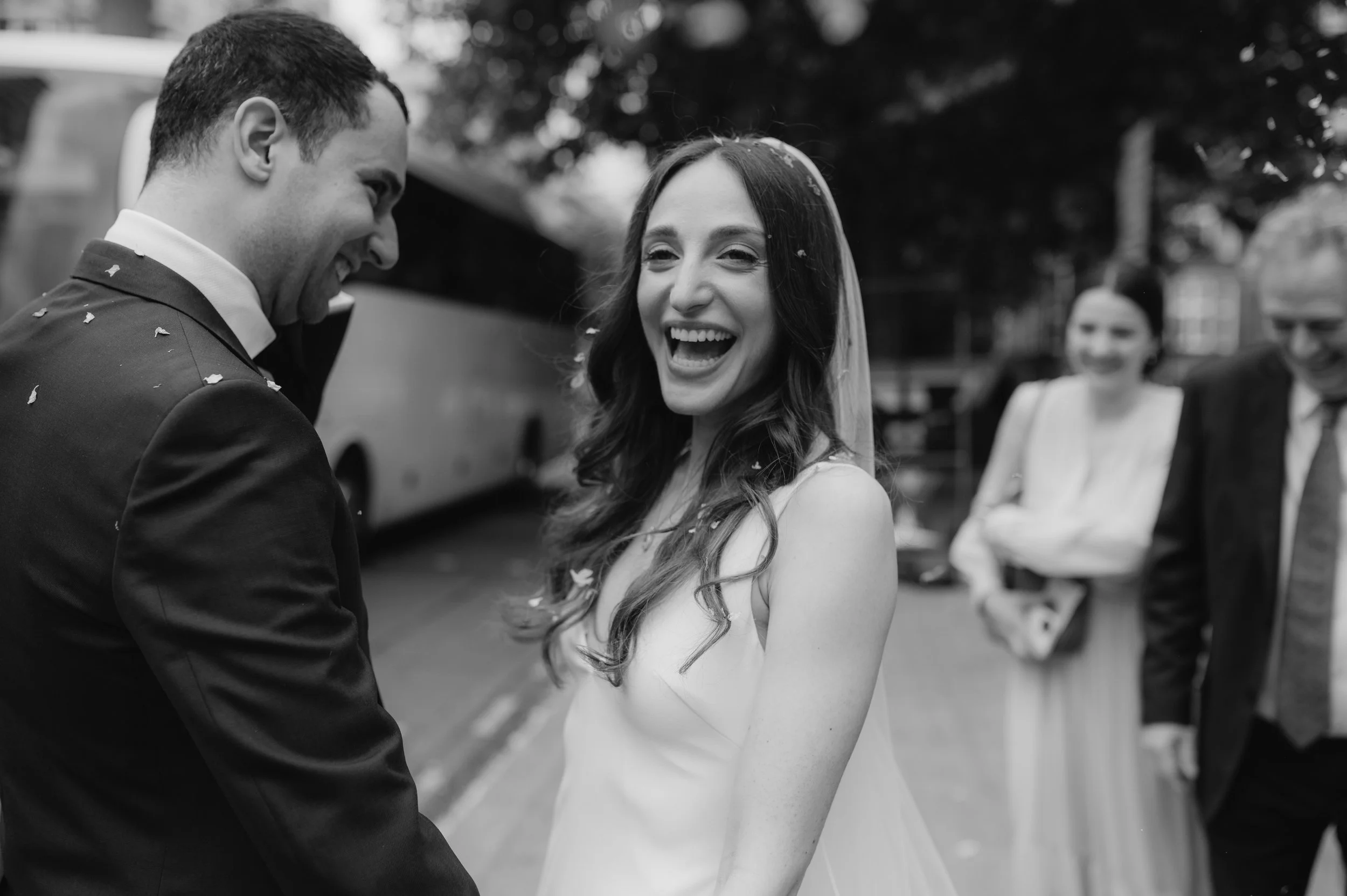 London wedding photography at Marylebone Town Hall bride and groom in confetti tunnel
