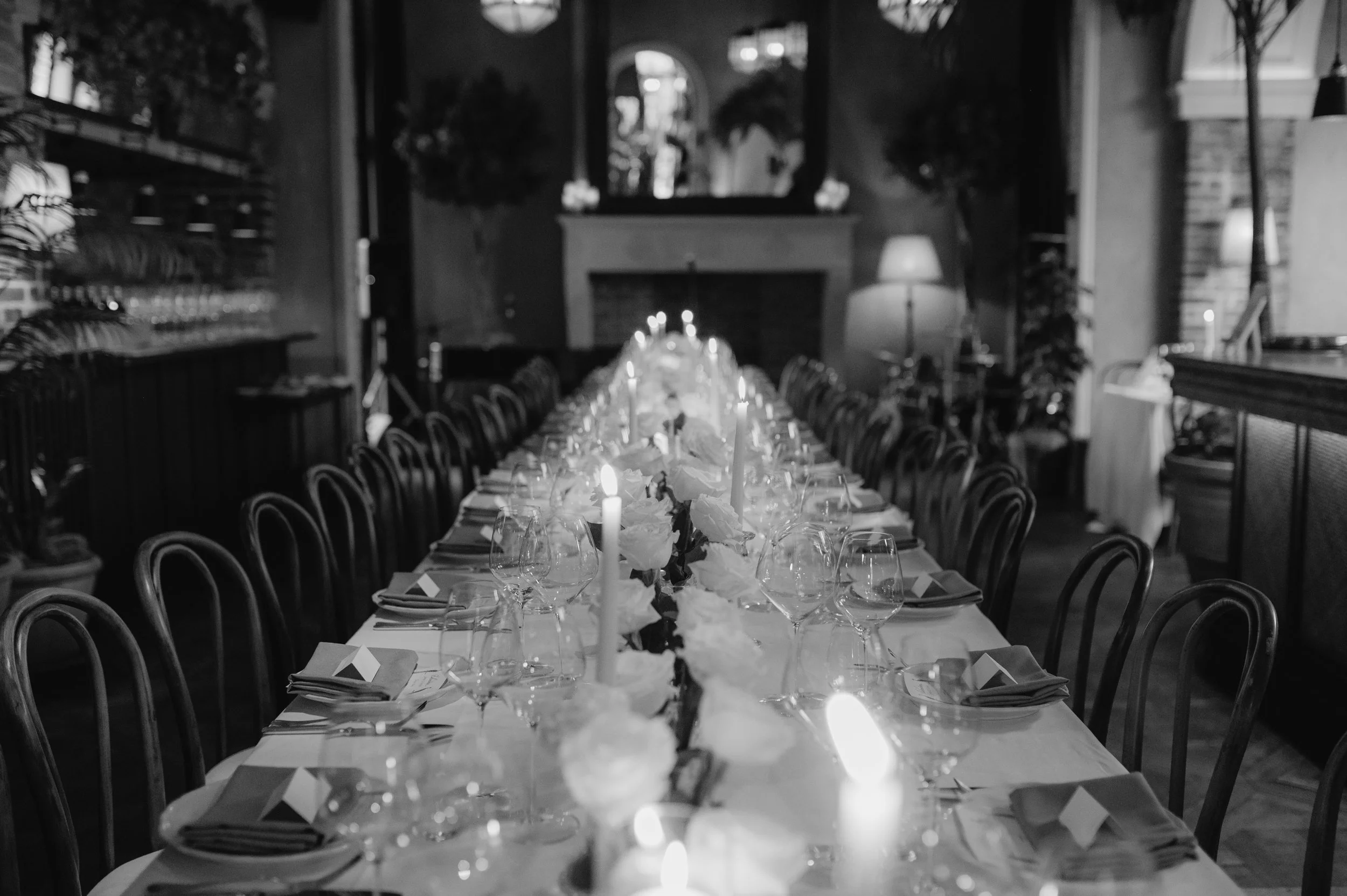 London wedding photography at Belvedere in Holland Park white roses and candles on table set up