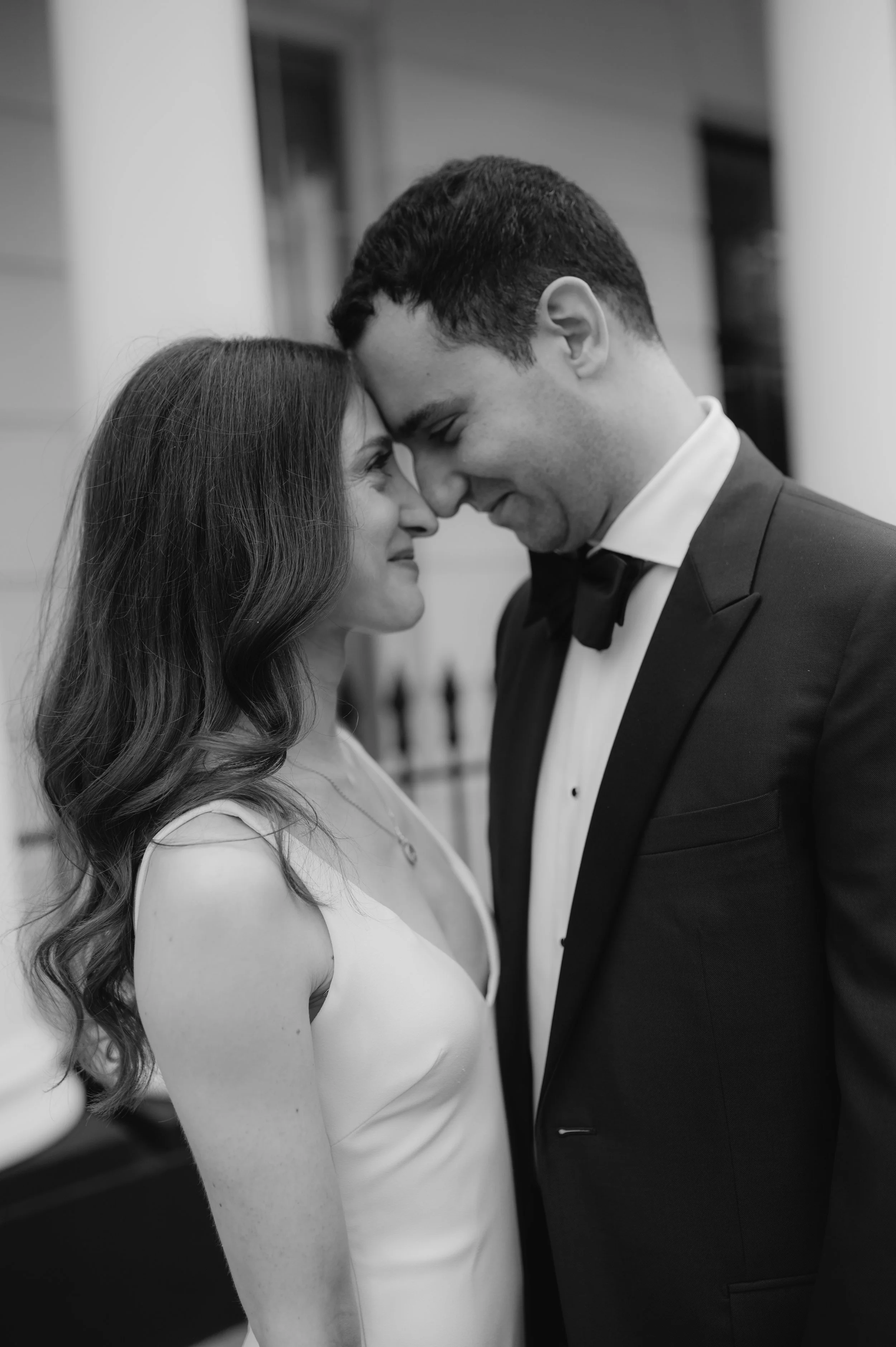 London wedding photography at Marylebone Town Hall bride and groom touching foreheads