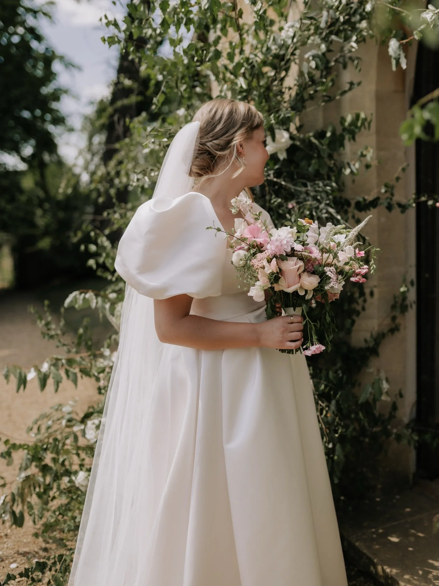 This photo has crept up to be one of my all time favourites. 

A fleeting moment, caught between post ceremony and pre confetti. A time that is often beautiful giddy chaos full of tears and shouts of joy as the couple celebrate what they had just sha