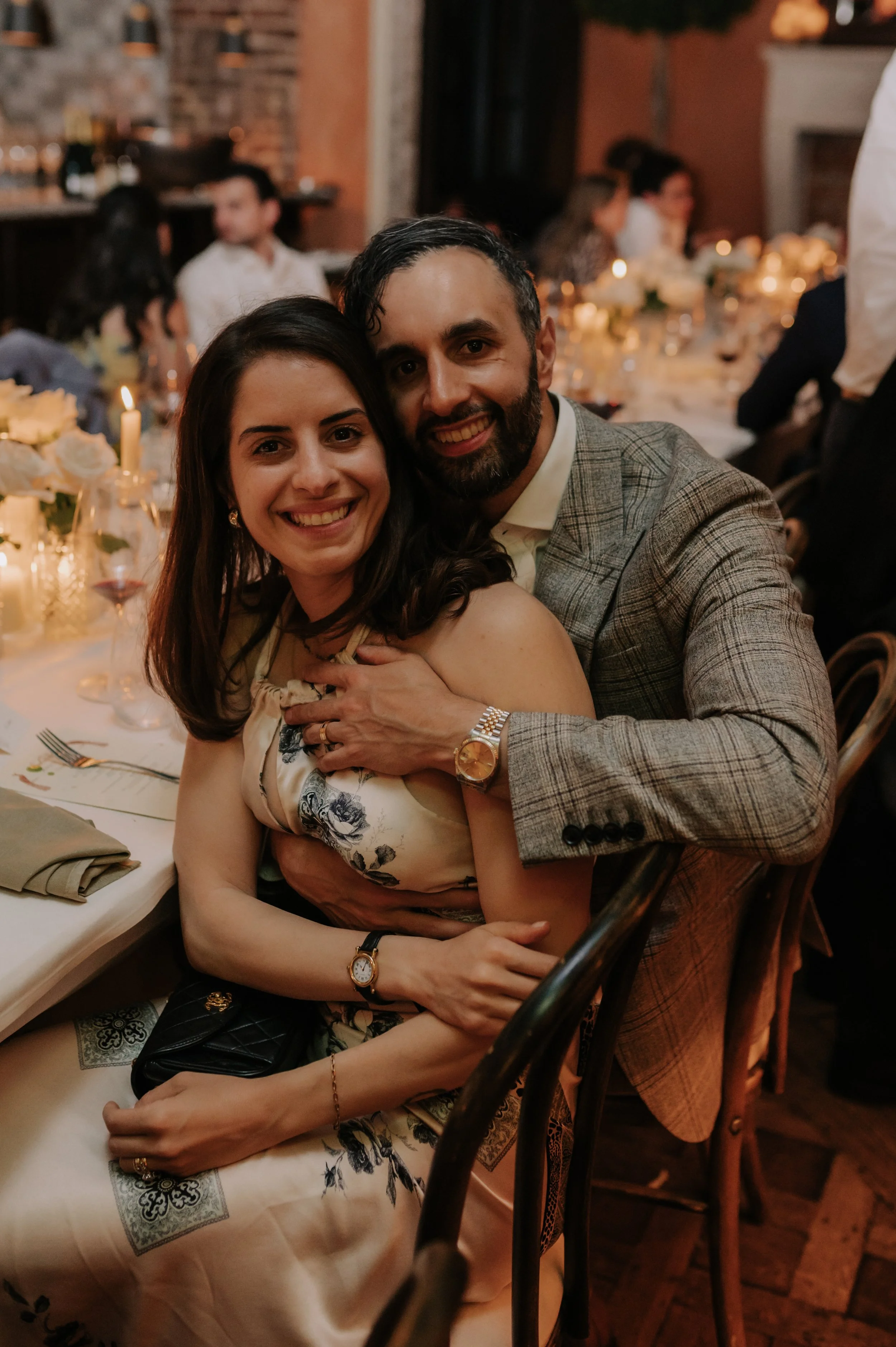 candlelit dinner London wedding photography at Belvedere in Holland Park guests smiling at camera 