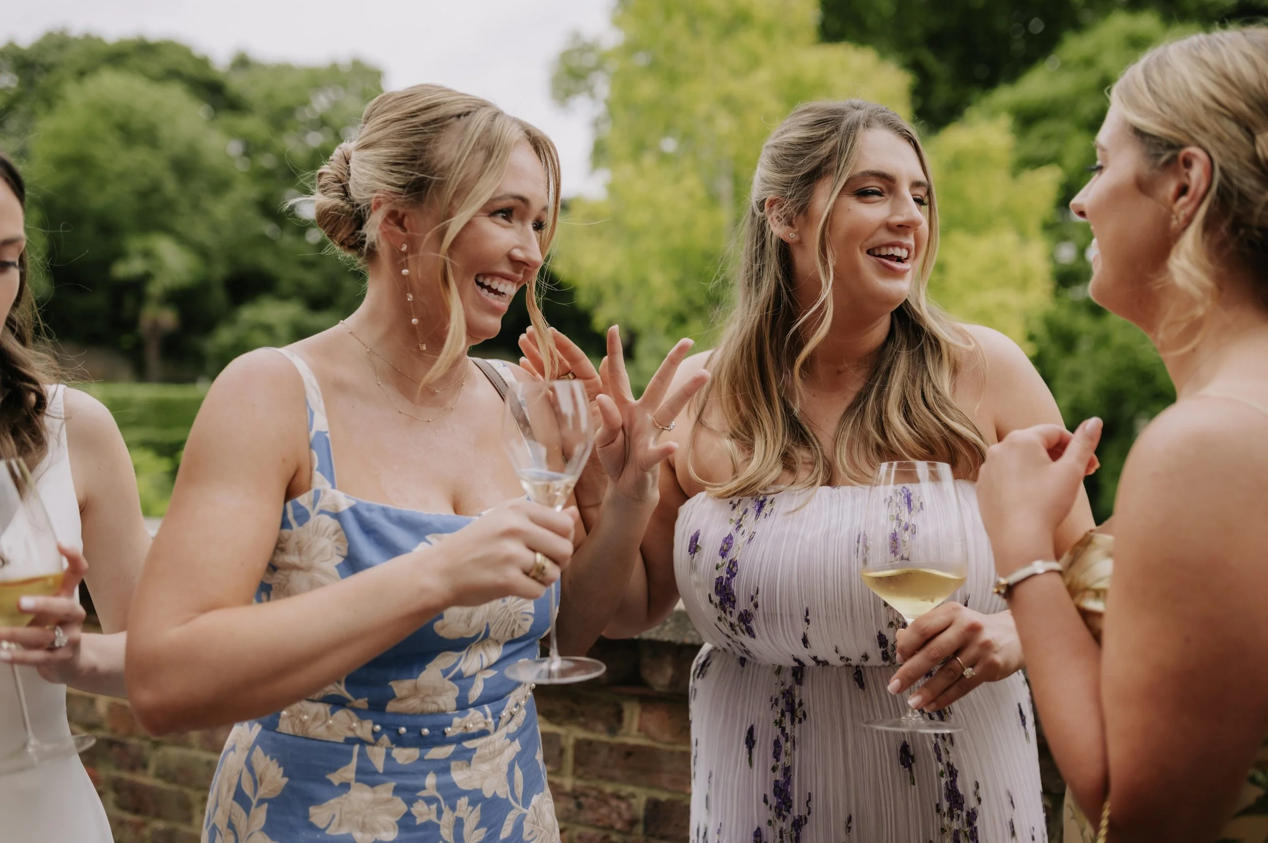 London wedding photography at Belvedere in Holland Park guests laughing 