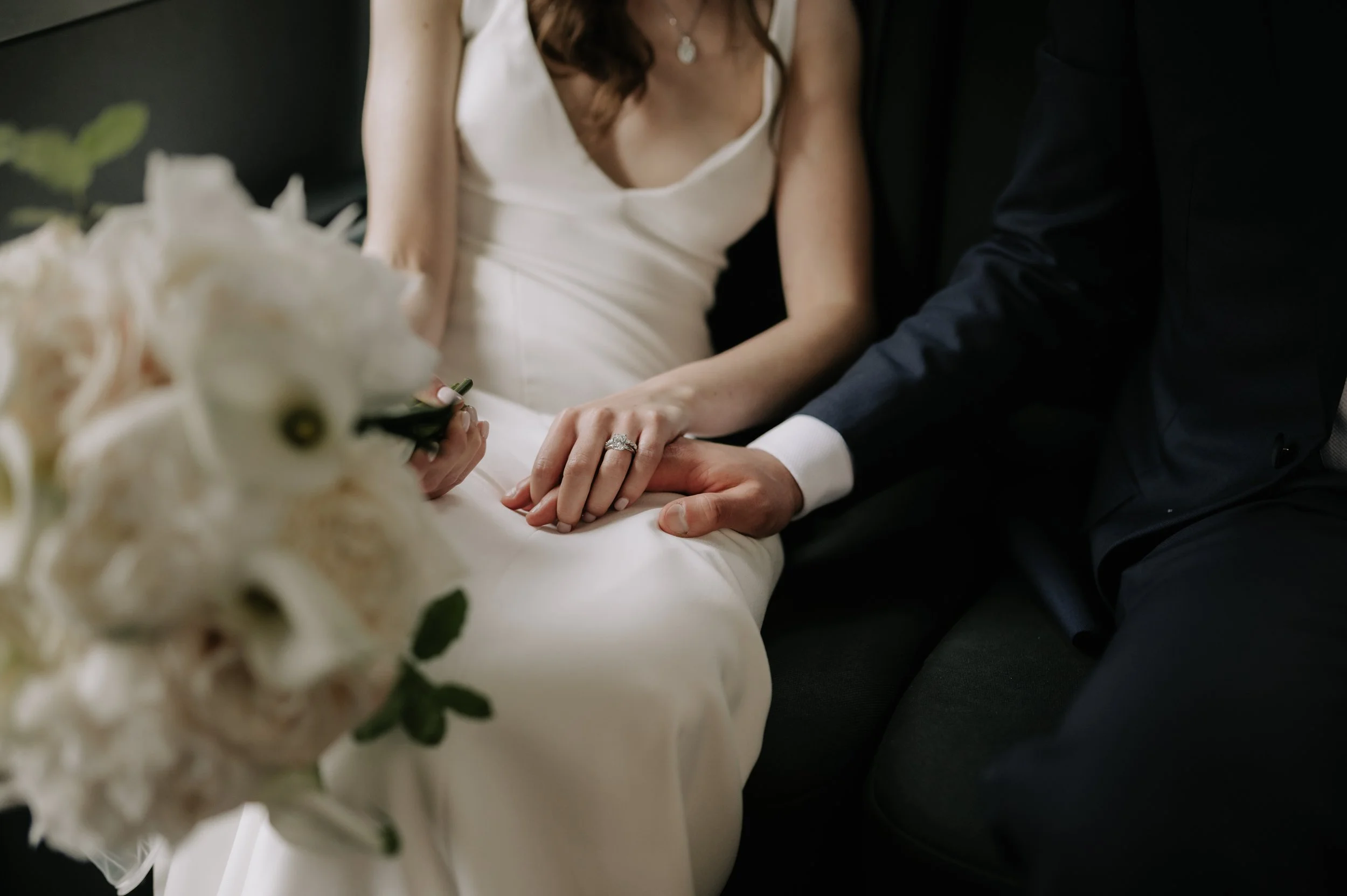 London wedding photography at Marylebone Town Hall bride and groom holding hands