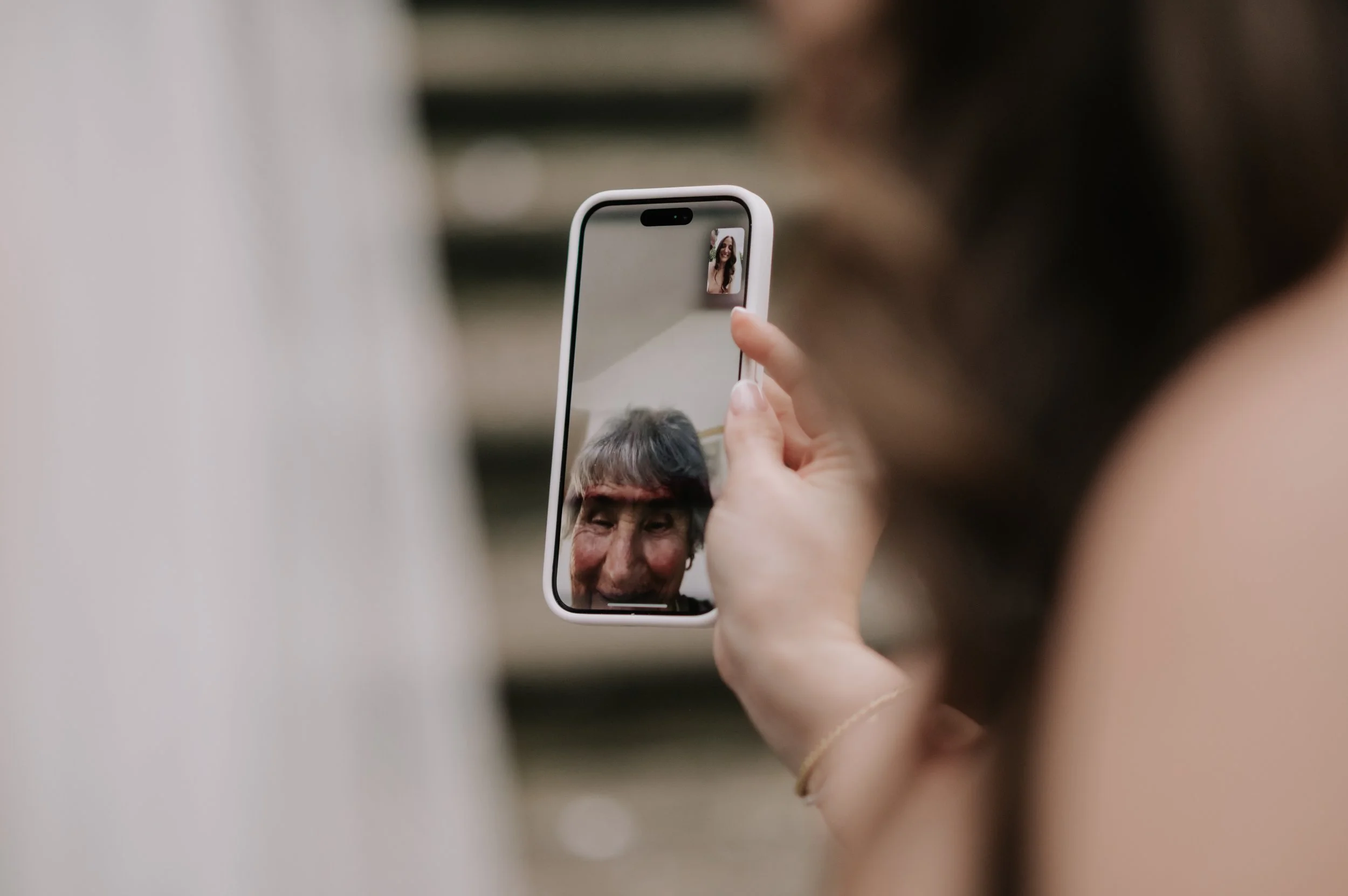 London wedding photography at Marylebone Town Hall elderly relative on FaceTime 