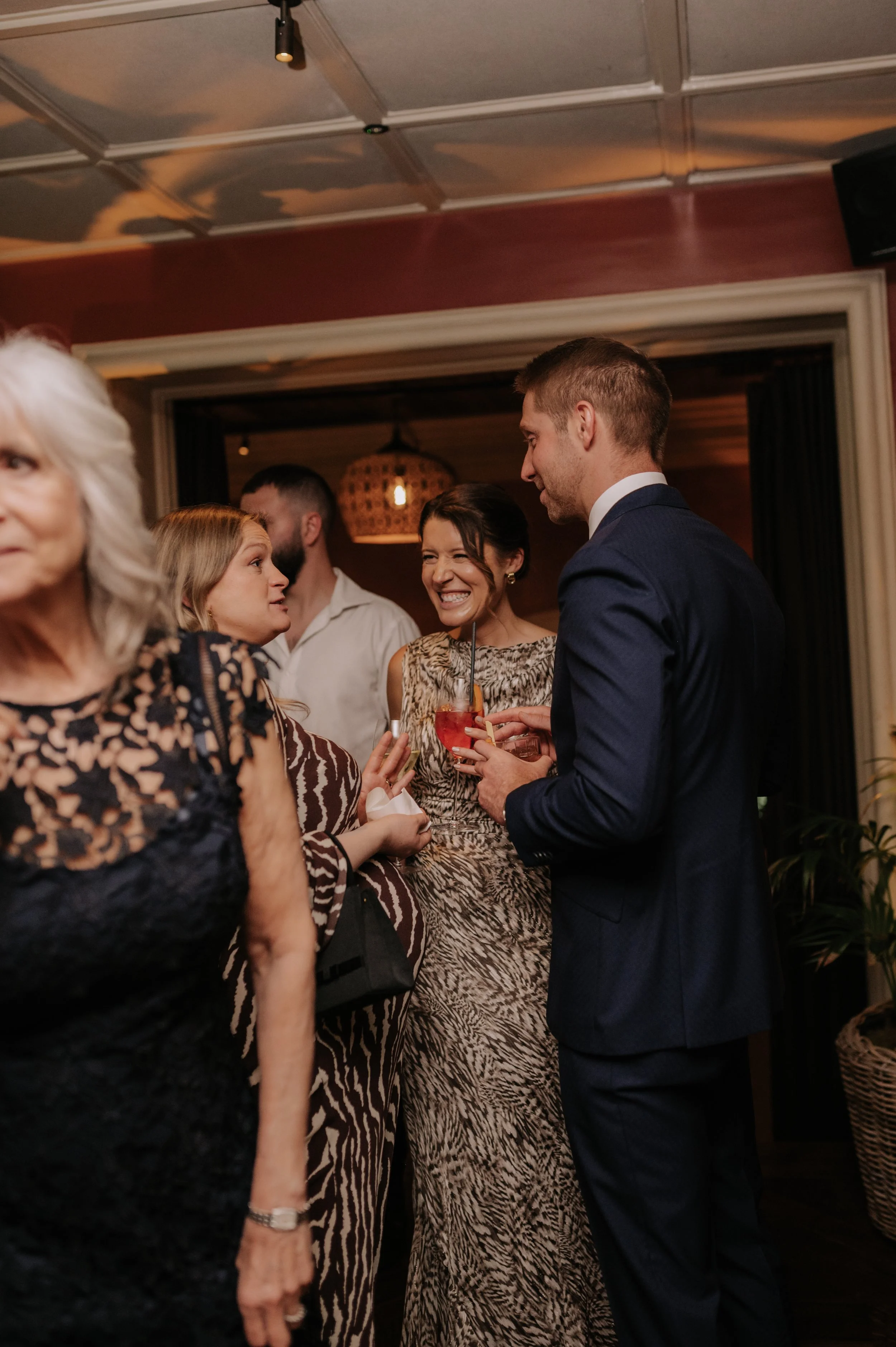 London wedding photography at Belvedere in Holland Park guest smiling