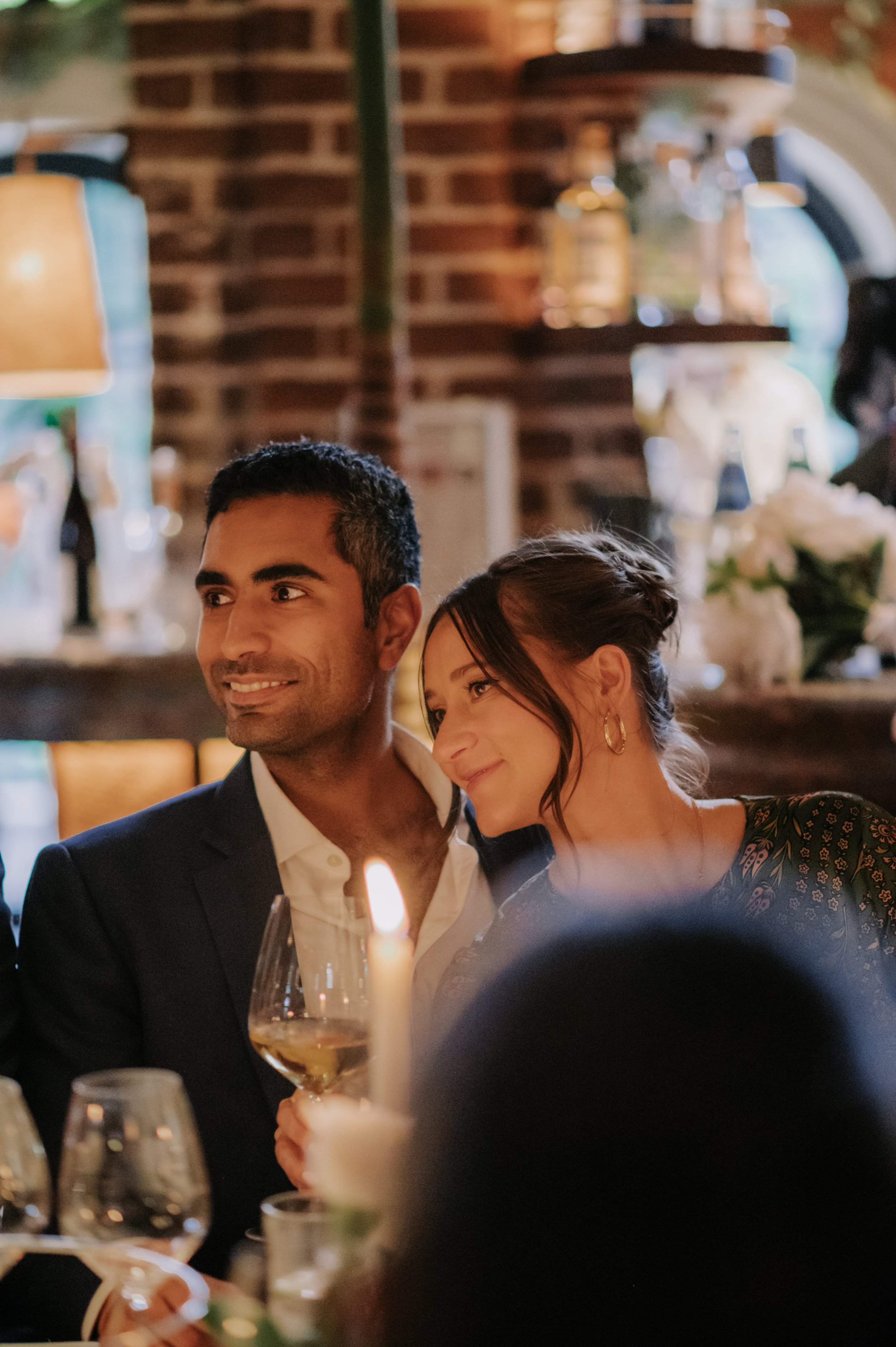 candlelit dinner London wedding photography at Belvedere in Holland Park guests smiling 