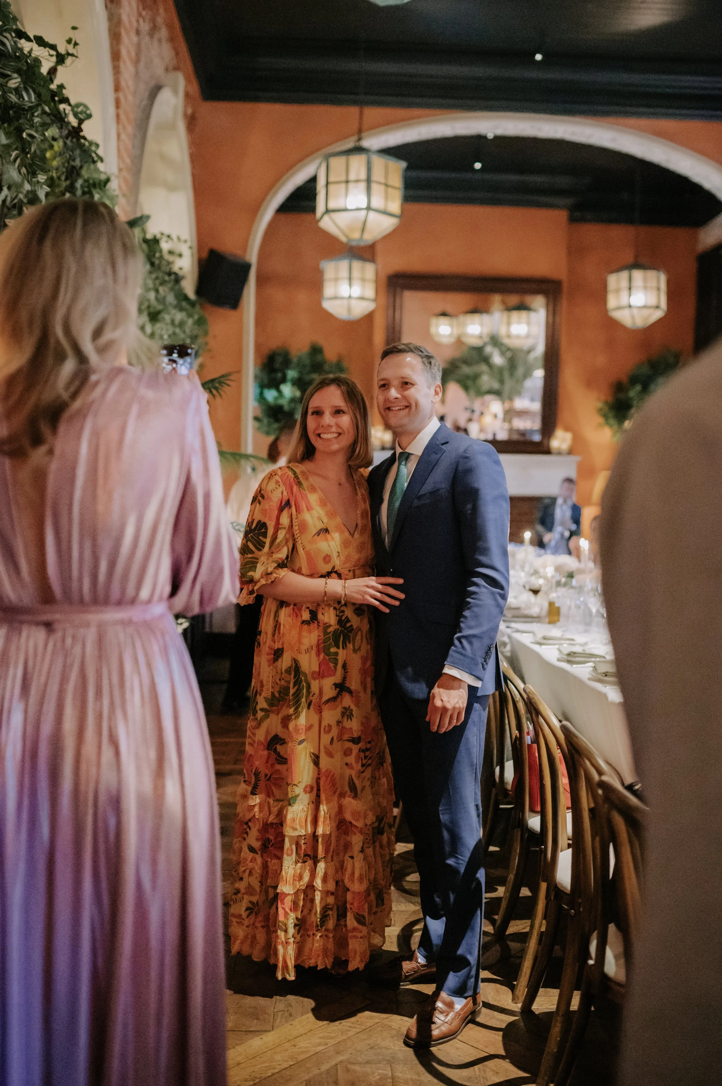 London wedding photography at Belvedere in Holland Park guests smiling for camera 