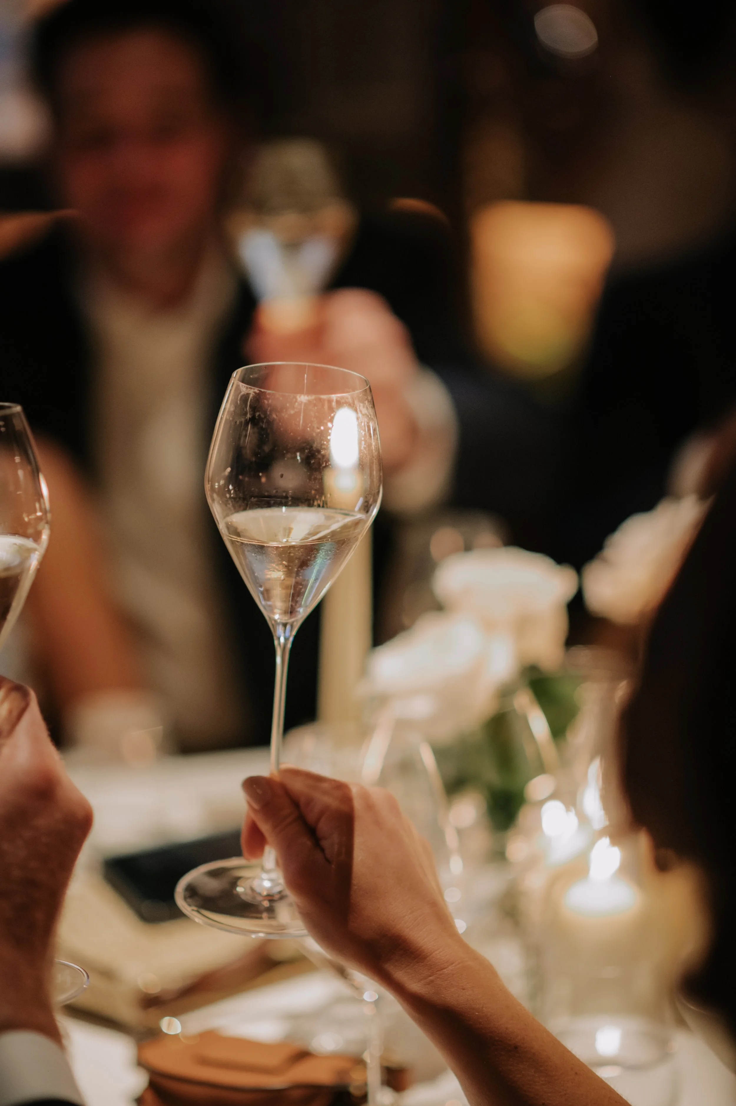 candlelit dinner London wedding photography at Belvedere in Holland Park glass of champagne 