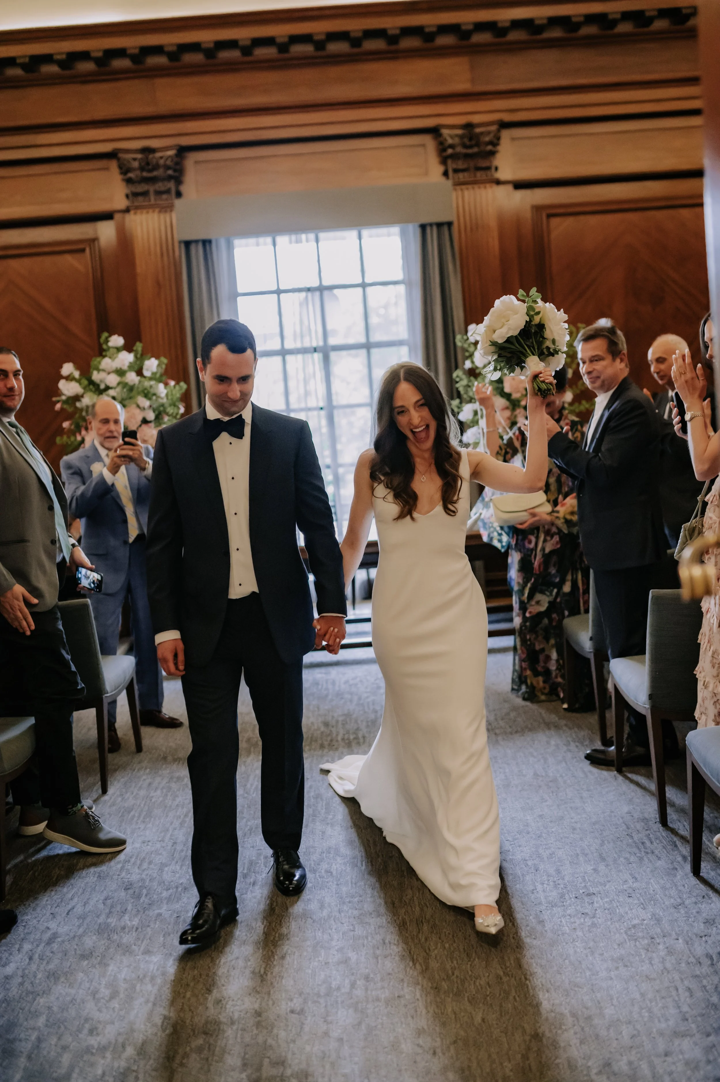 London wedding photography at Marylebone Town Hall bride and groom exiting ceremony