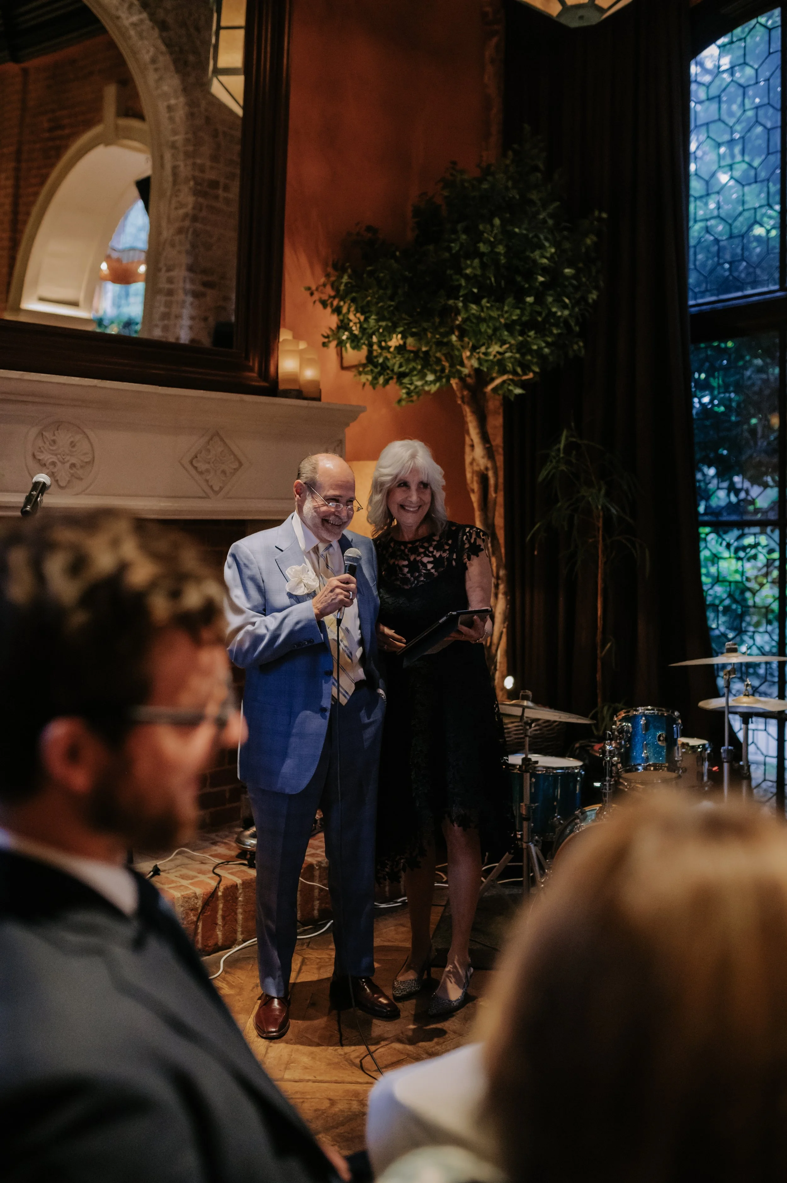 candlelit dinner London wedding photography at Belvedere in Holland Park dad and step mum giving speech