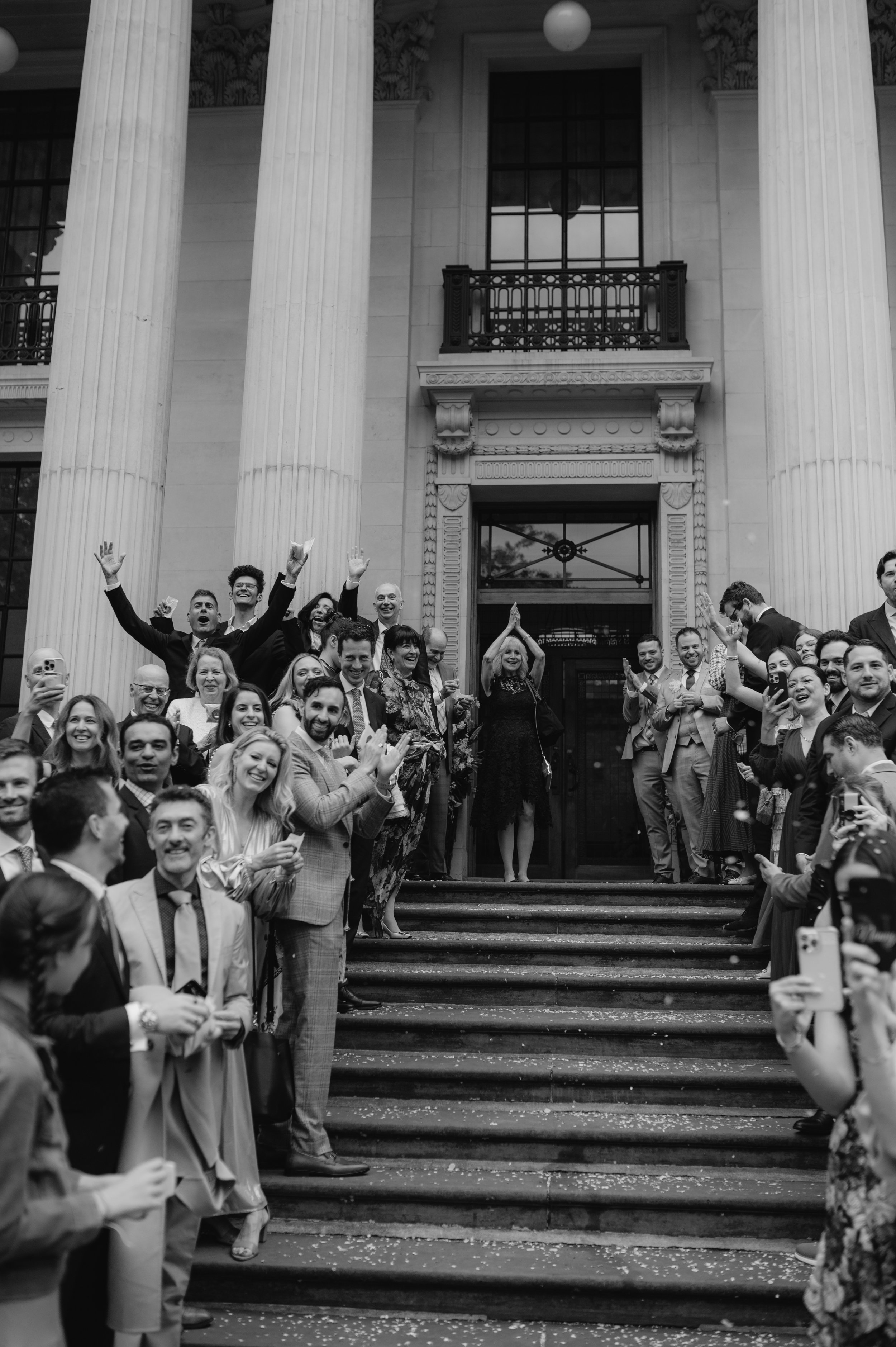 London wedding photography at Marylebone Town Hall guests cheering