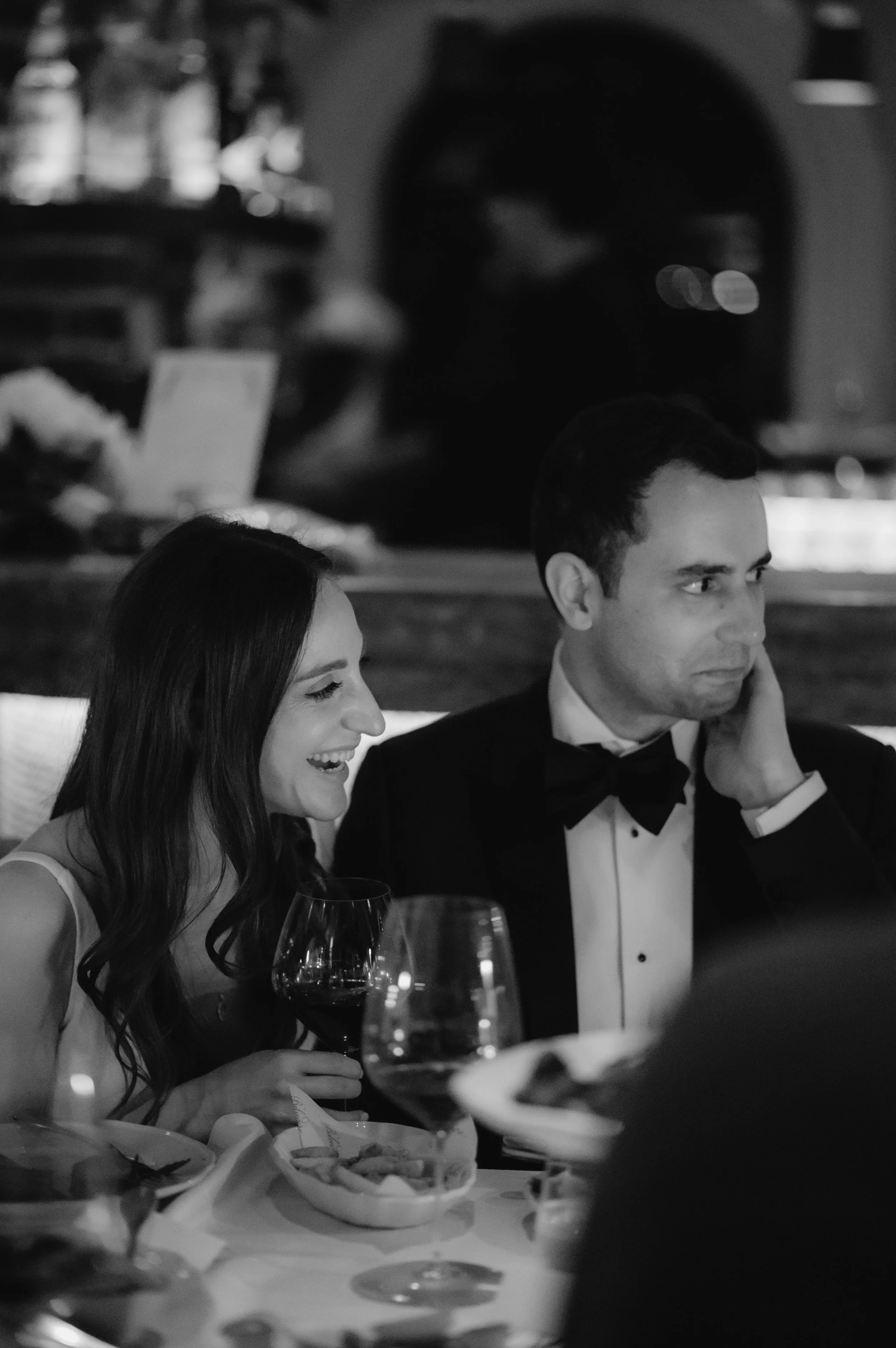 candlelit dinner London wedding photography at Belvedere in Holland Park bride and groom smiling 