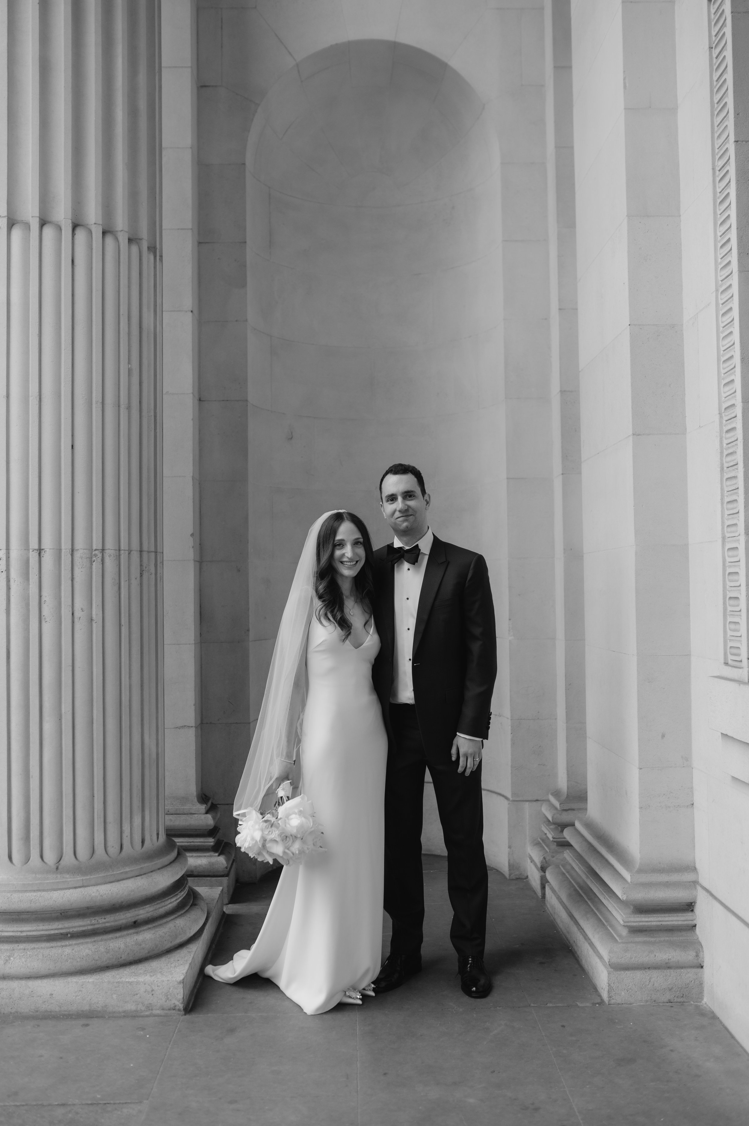 London wedding photography at Marylebone Town Hall bride and groom smiling at camera